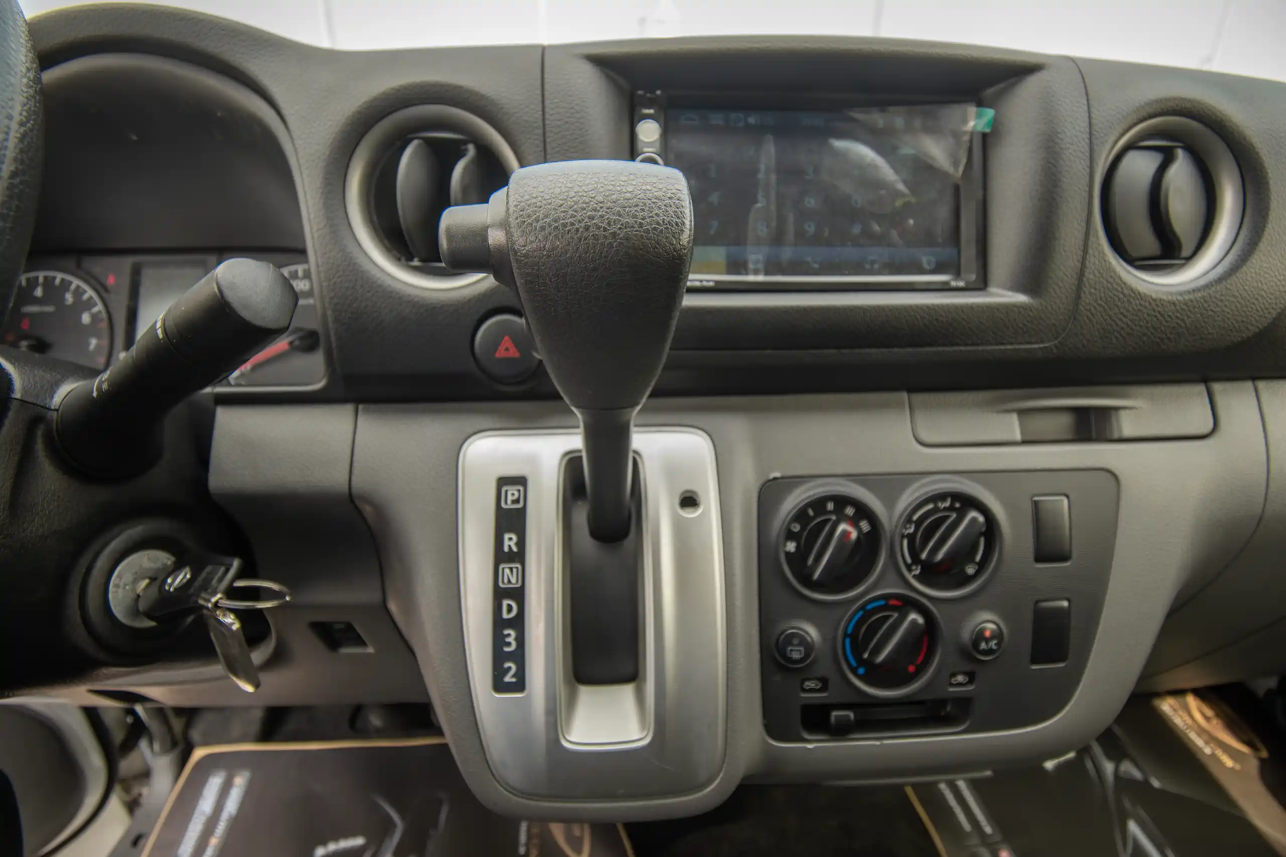 Used 2022 Nissan Urvan High Roof White – Center Console & Gear Shifter at First Choice Cars Sharjah