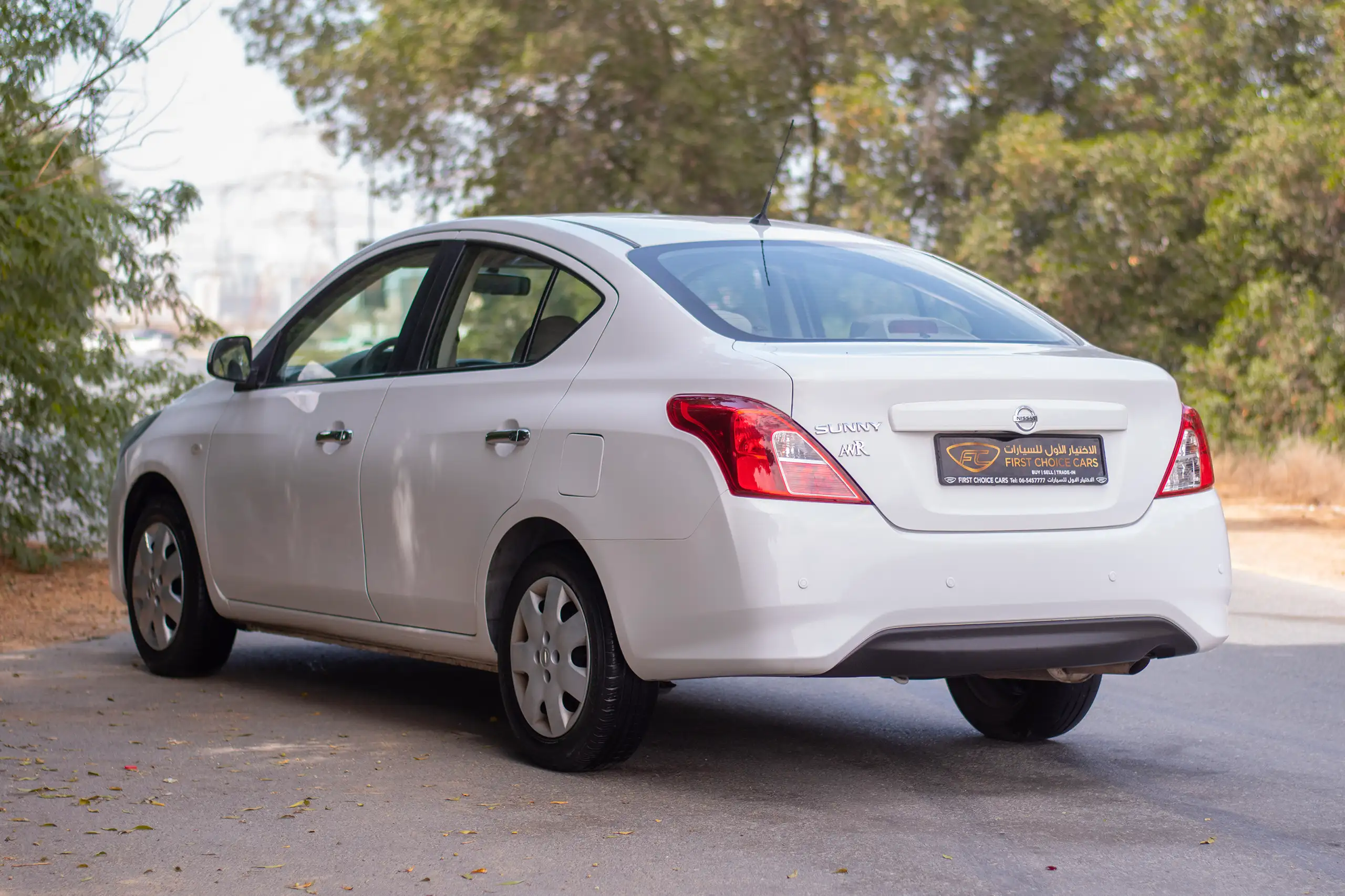 Used 2022 Nissan Sunny SV White – Left Back Diagonal (45°) View at First Choice Cars Sharjah