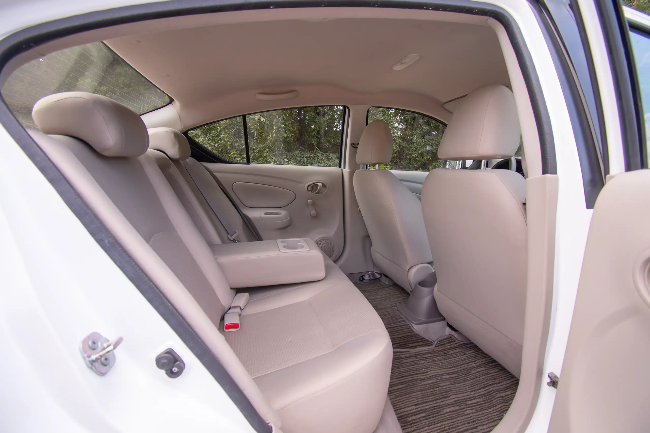 Used 2022 Nissan Sunny SV White – Rear Passenger Side Cabin View at First Choice Cars Sharjah