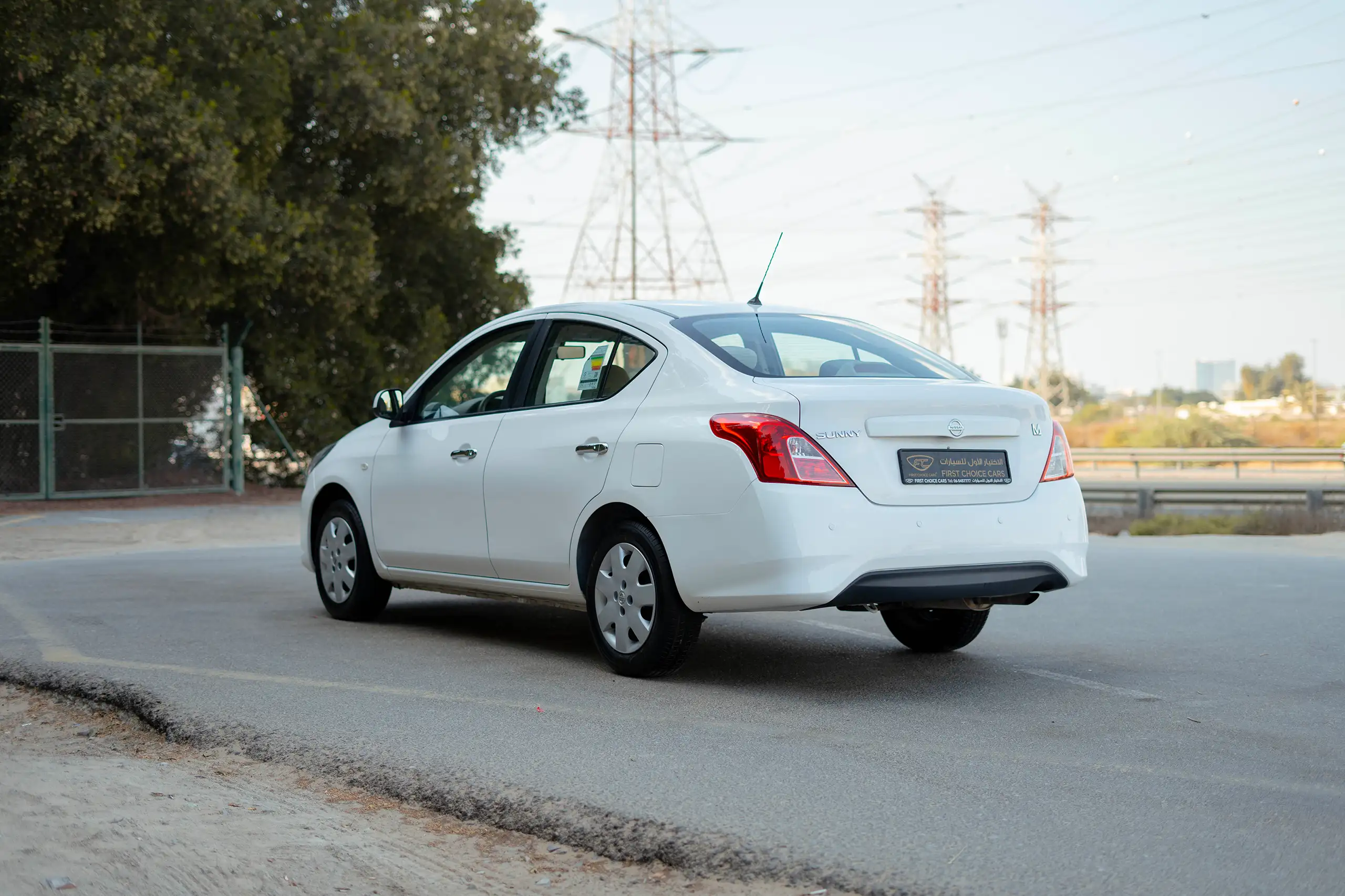 Used 2022 Nissan Sunny SV in White – Left Back Diagonal (45°) View for Sale at First Choice Cars Dubai Sharjah