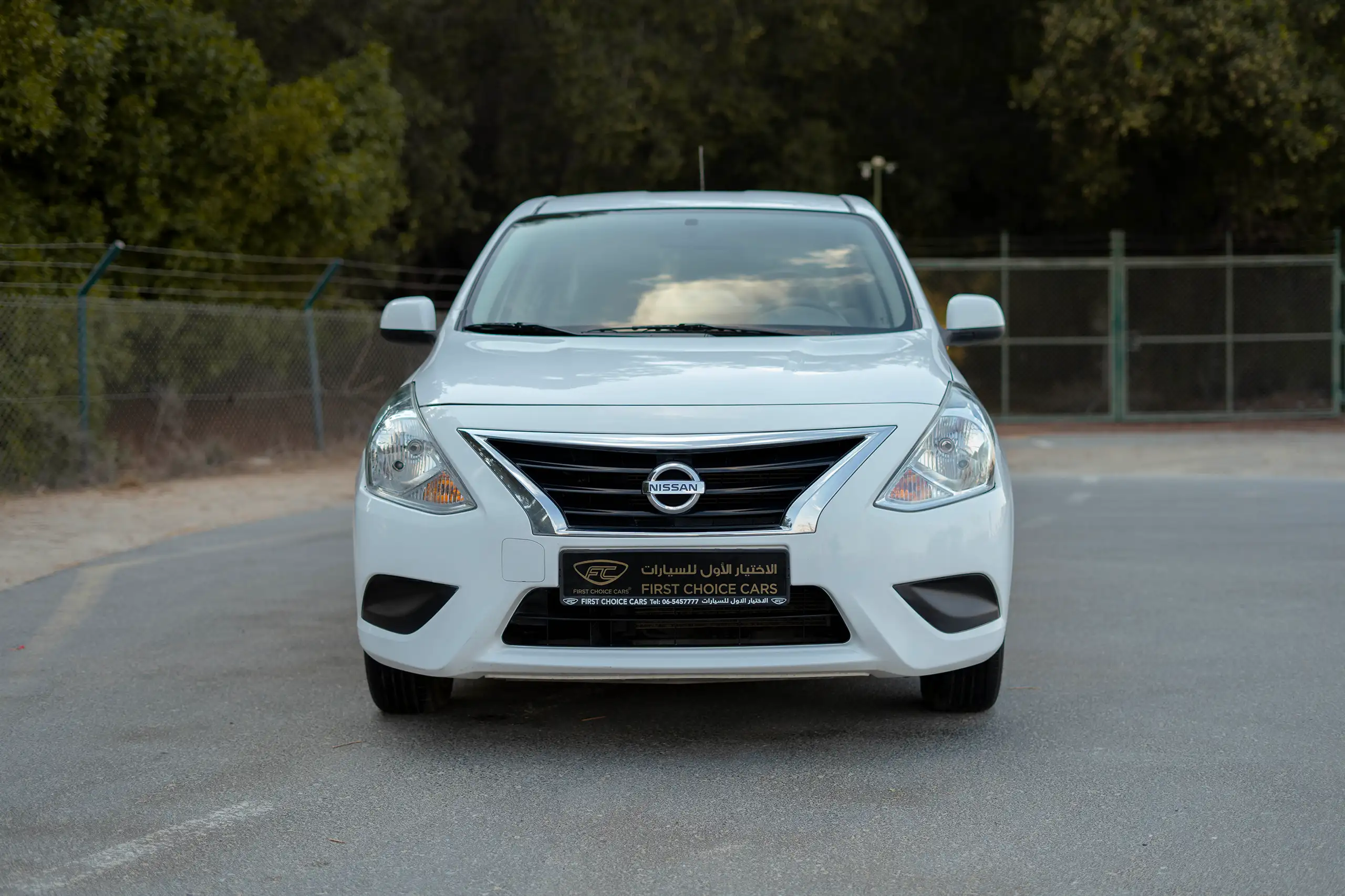 Used 2022 Nissan Sunny SV in White – Front View for Sale at First Choice Cars Dubai Sharjah