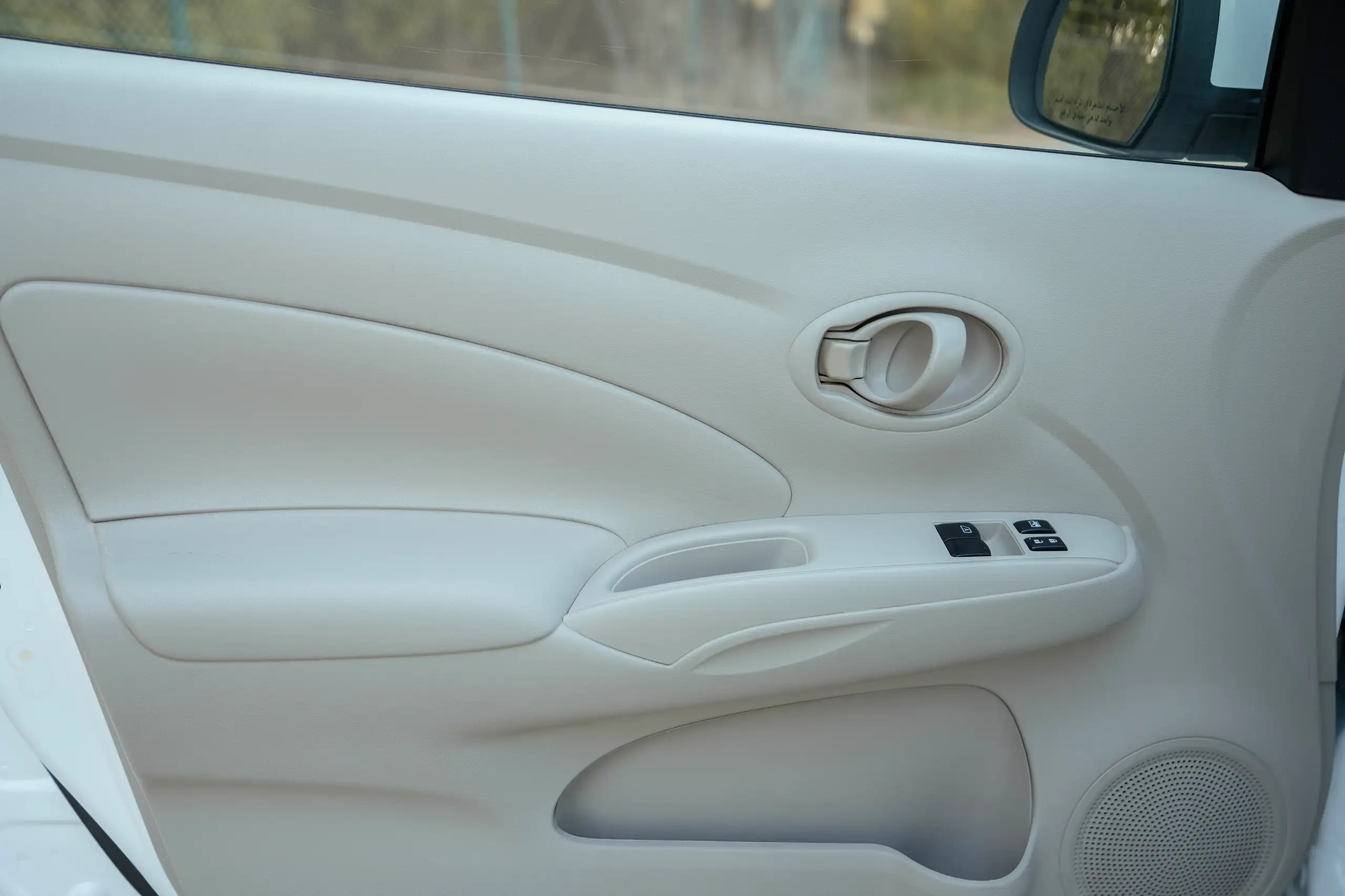Used 2022 Nissan Sunny SV in White – Driver Door Panel Full View for Sale at First Choice Cars Dubai Sharjah