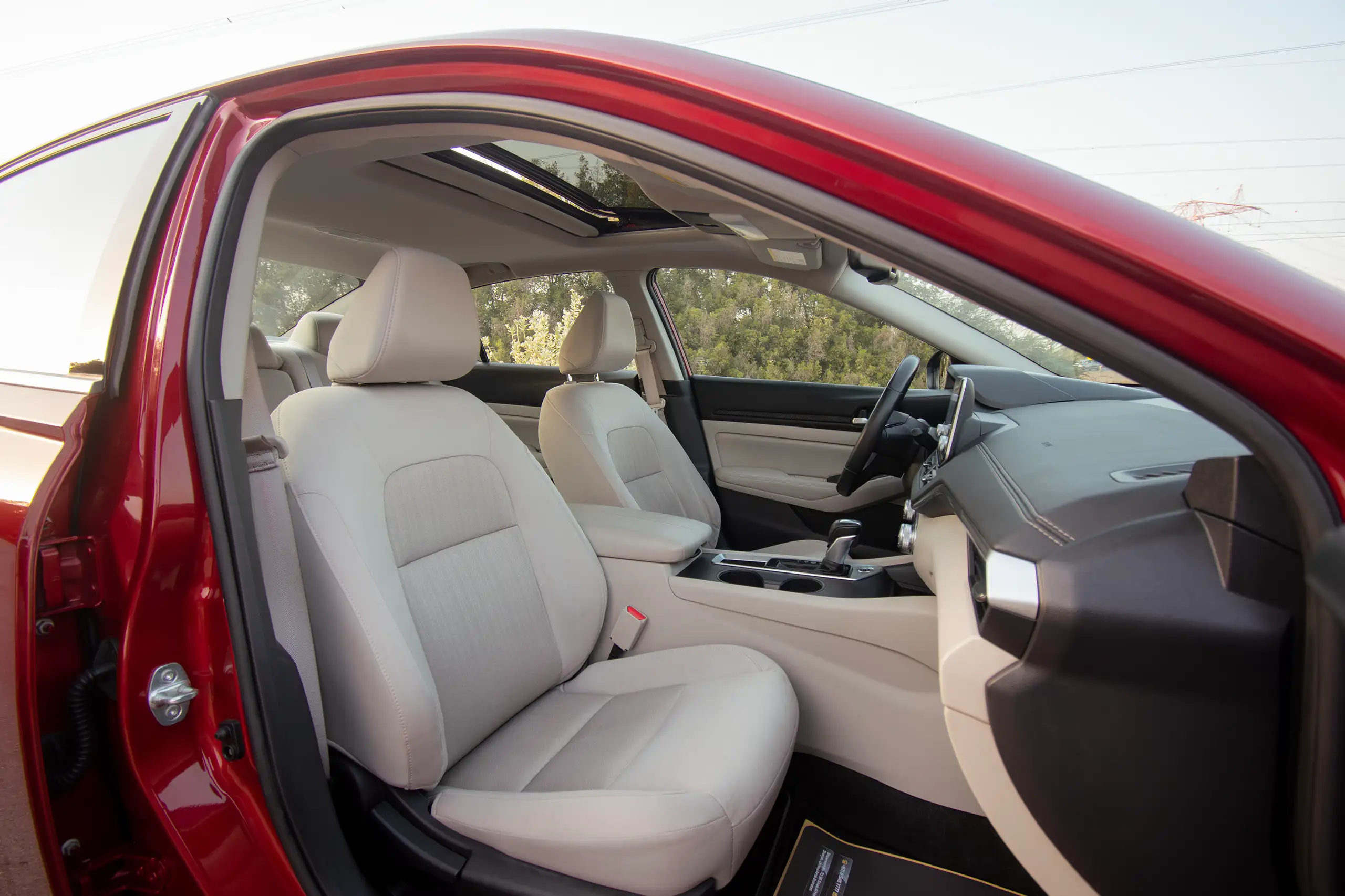 Used 2022 Nissan Altima SV Red – Front Passenger Side Cabin View at First Choice Cars Sharjah