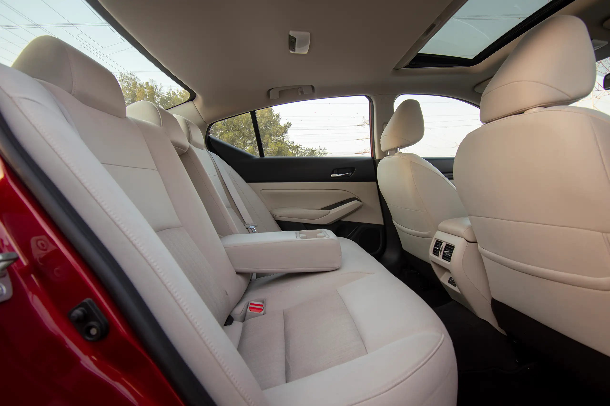 Used 2022 Nissan Altima SV Red – Rear Passenger Side Cabin View at First Choice Cars Sharjah
