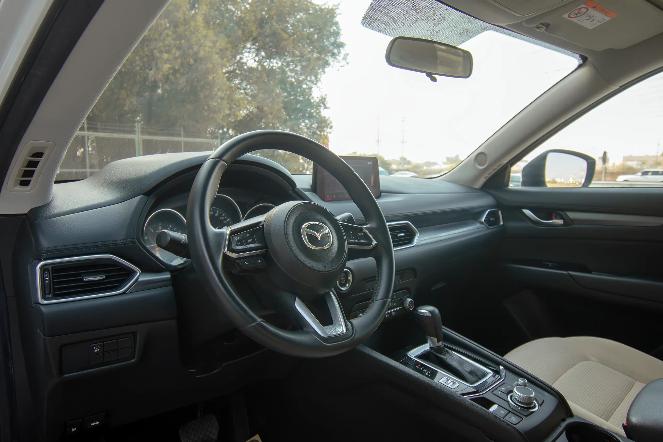 Used 2022 Mazda CX-5 GL White – Driver Side Dashboard & Steering View at First Choice Cars Sharjah