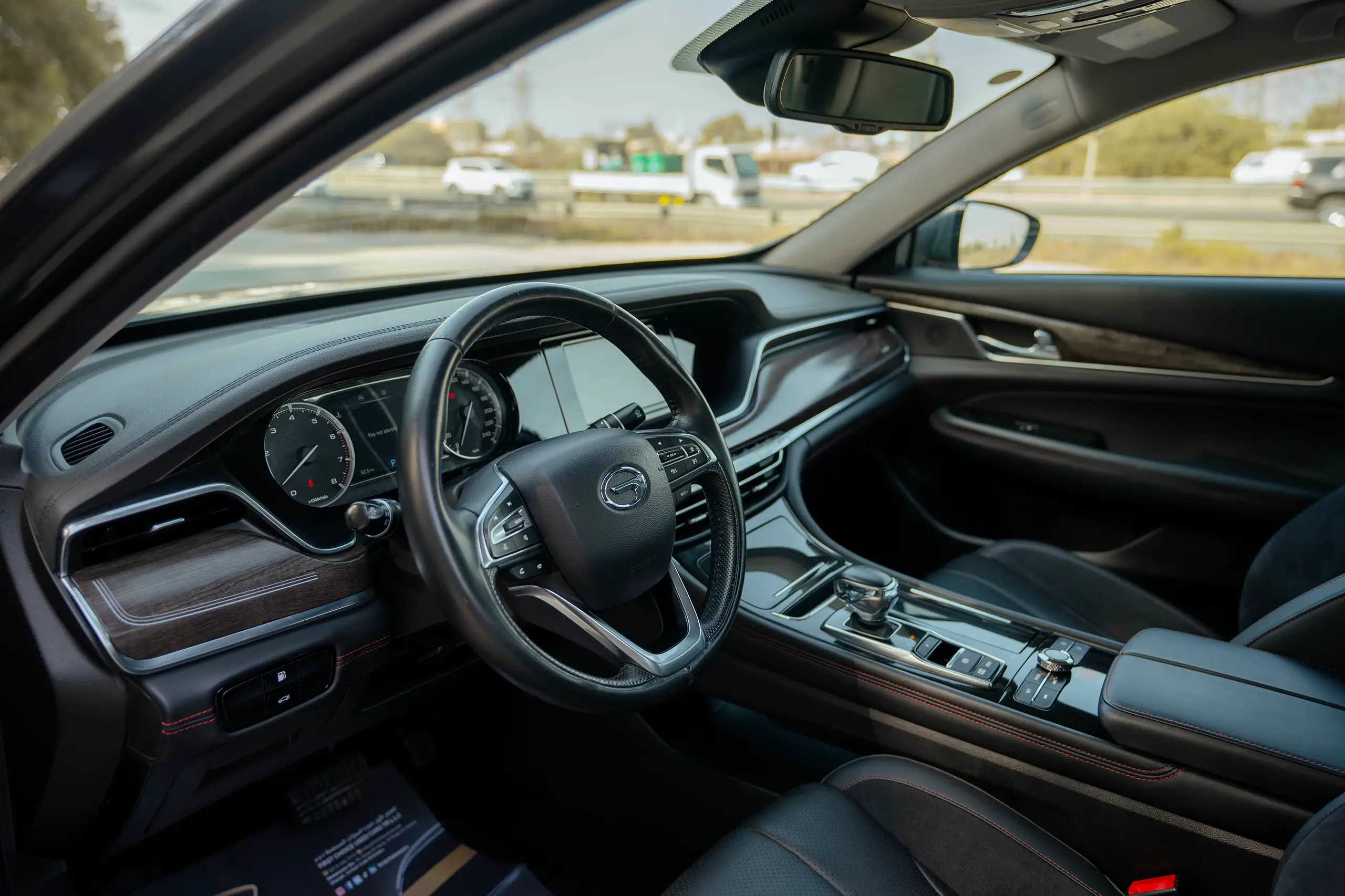 Used 2022 GAC GA8 GL Grey – Driver Side Dashboard & Steering View at First Choice Cars Sharjah