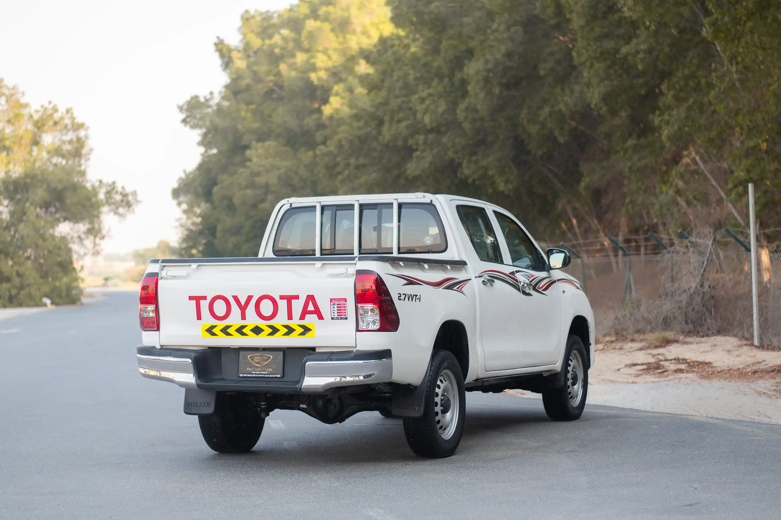 Used 2021 Toyota Hilux GL Double Cabin White – Right Back Diagonal (45°) View at First Choice Cars Sharjah