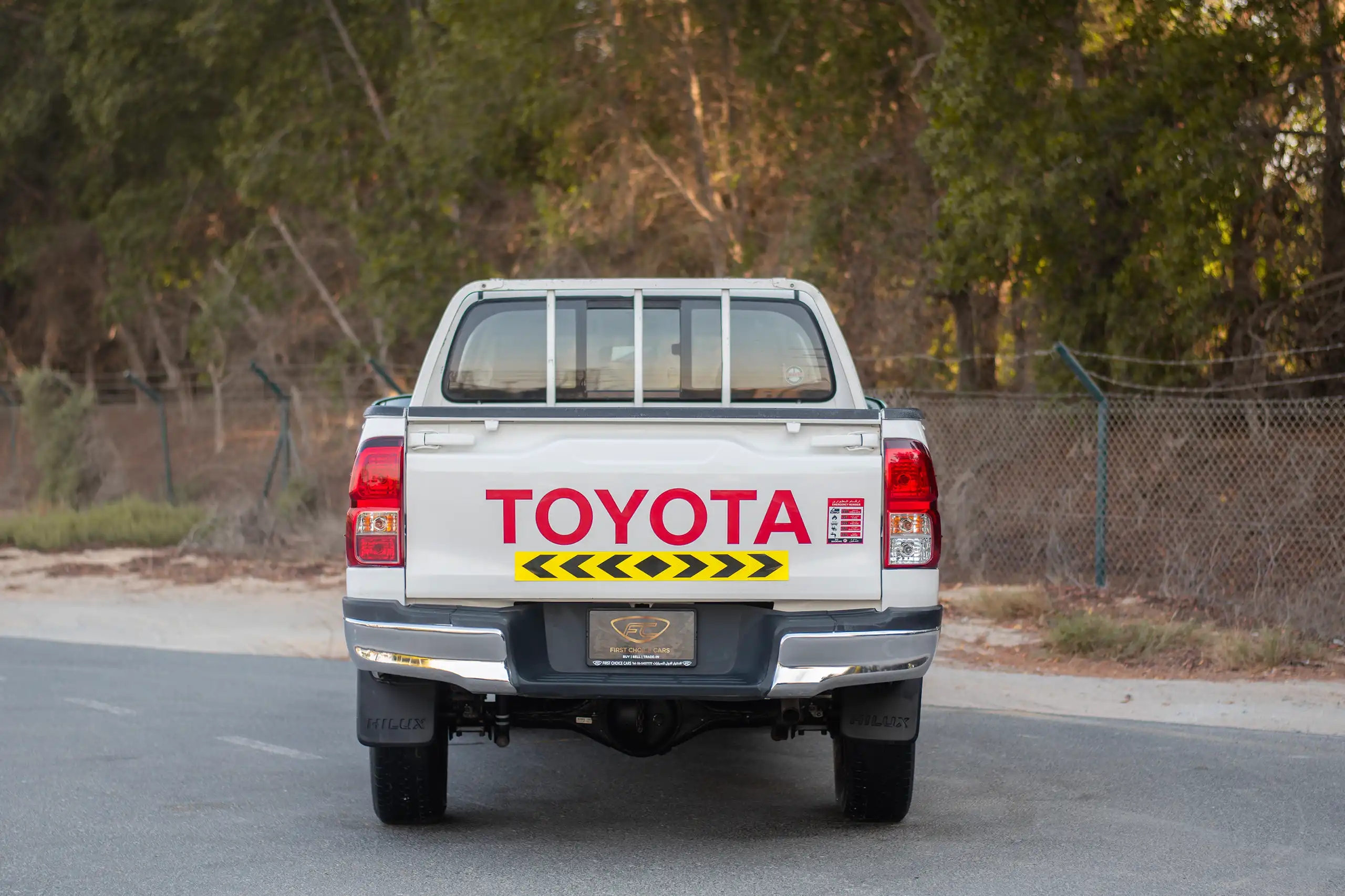 Used 2021 Toyota Hilux GL Double Cabin White – Back/Rear View at First Choice Cars Sharjah