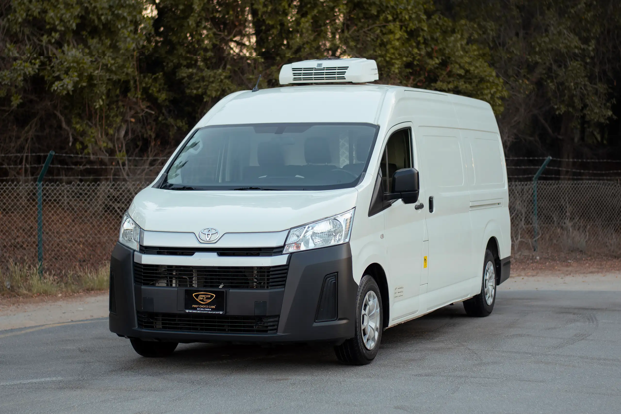 Used 2021 Toyota Hiace GL High Roof White – Left Front Diagonal (45°) View at First Choice Cars Sharjah
