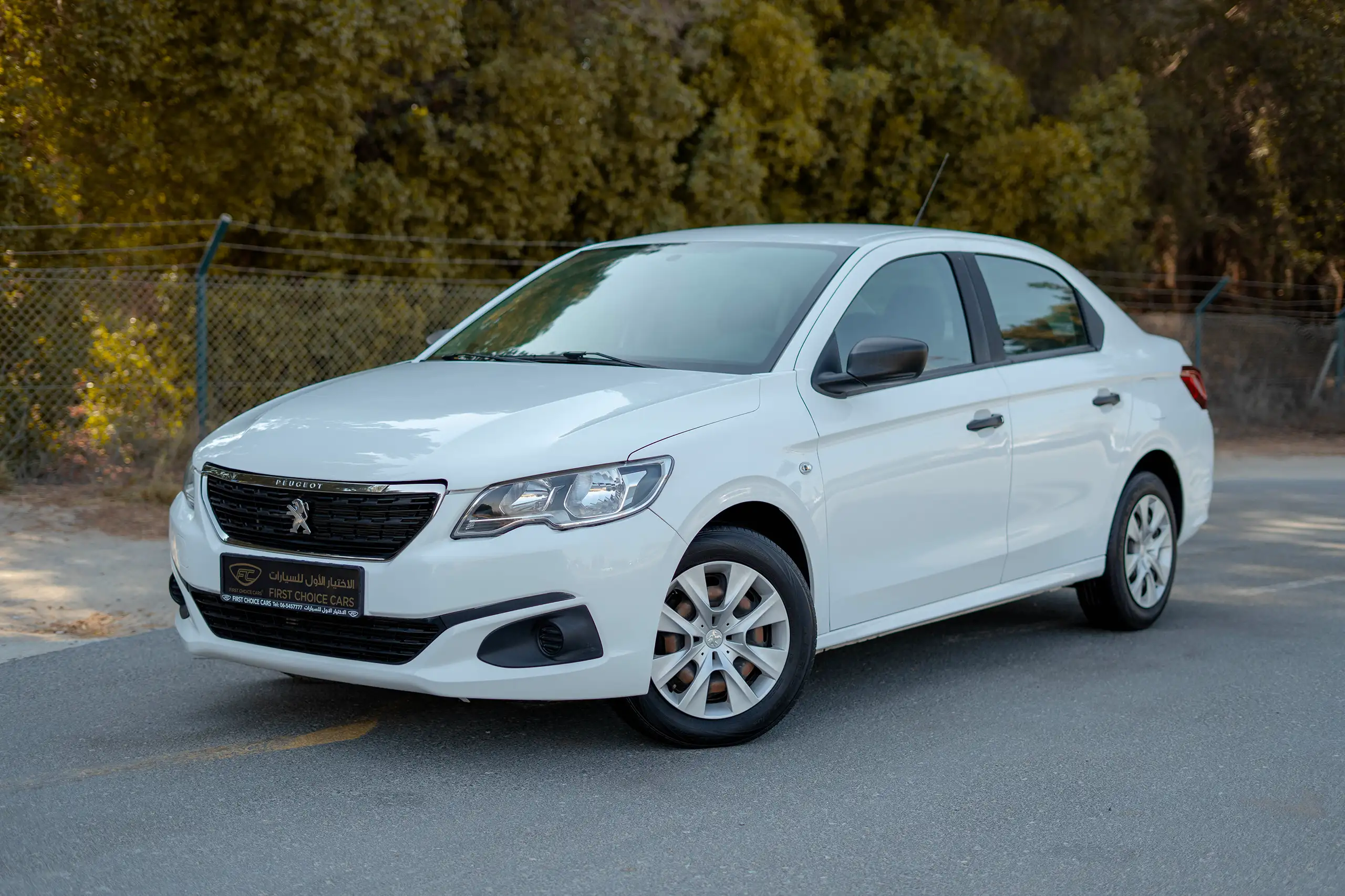 Used 2021 Peugeot 301 Allure in White – Left Front Diagonal (45°) View for Sale at First Choice Cars Dubai Sharjah