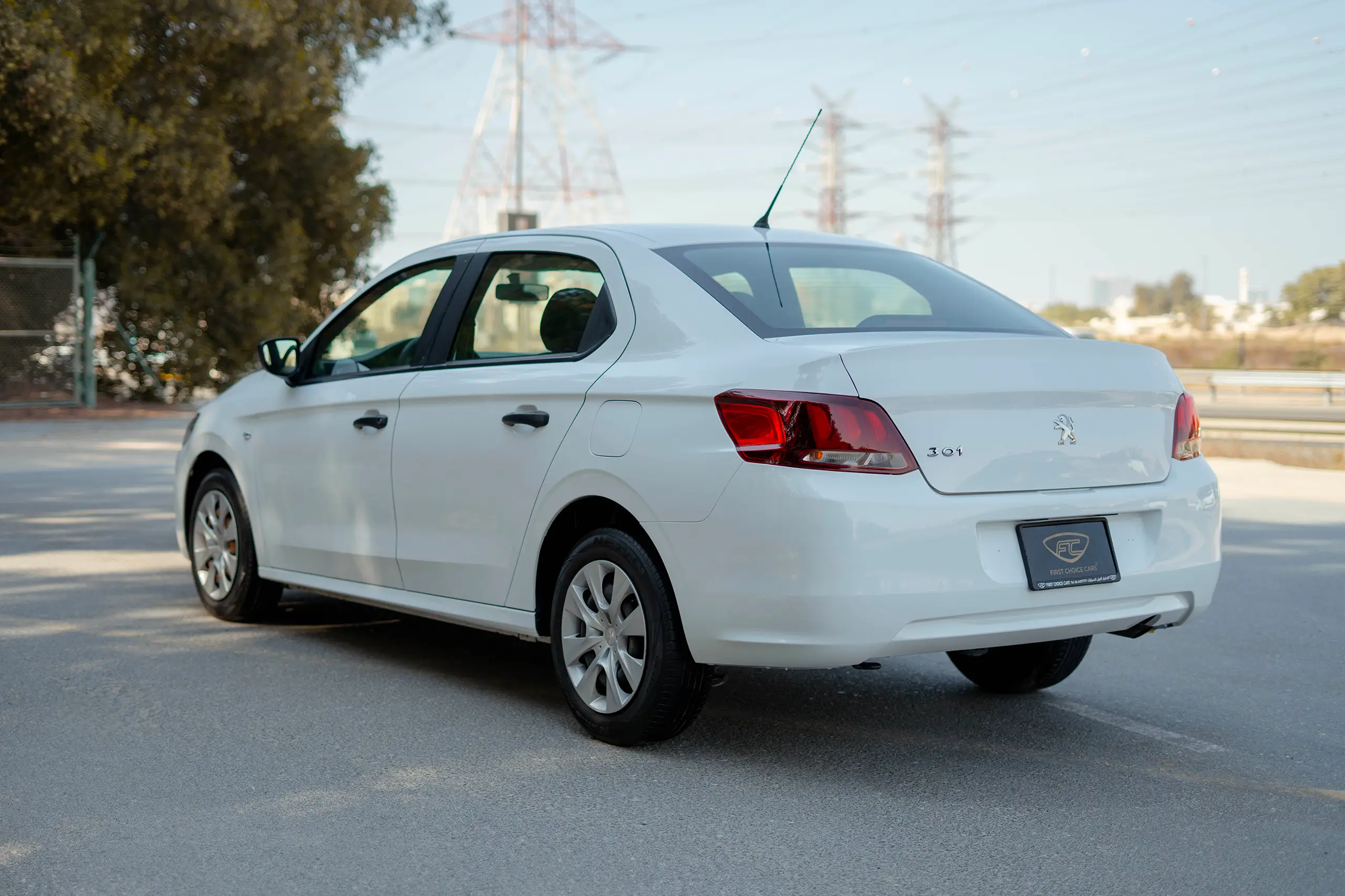 Used 2021 Peugeot 301 Allure in White – Left Back Diagonal (45°) View for Sale at First Choice Cars Dubai Sharjah