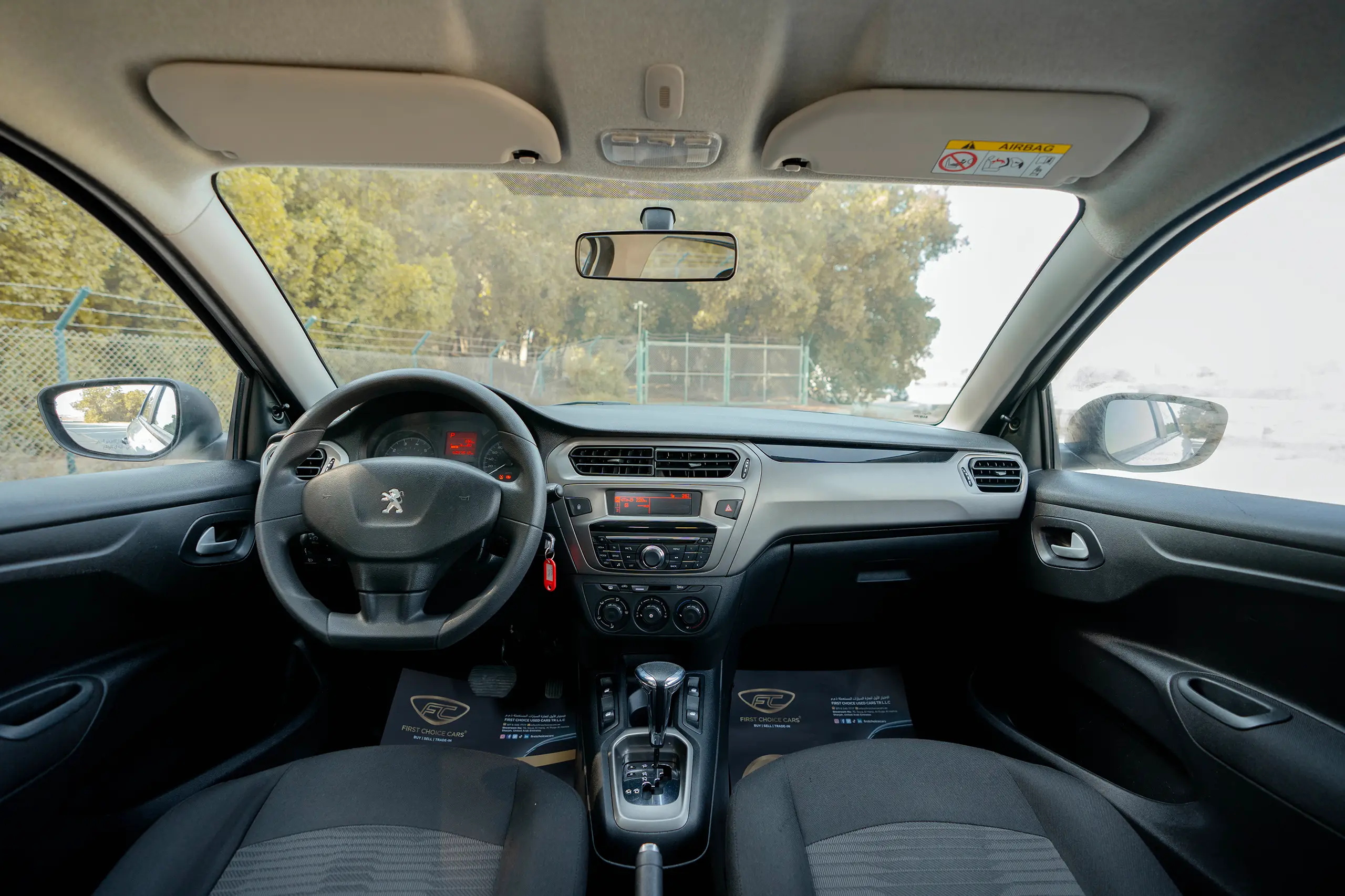 Used 2021 Peugeot 301 Allure in White – Front Cabin / Dashboard Full View for Sale at First Choice Cars Dubai Sharjah