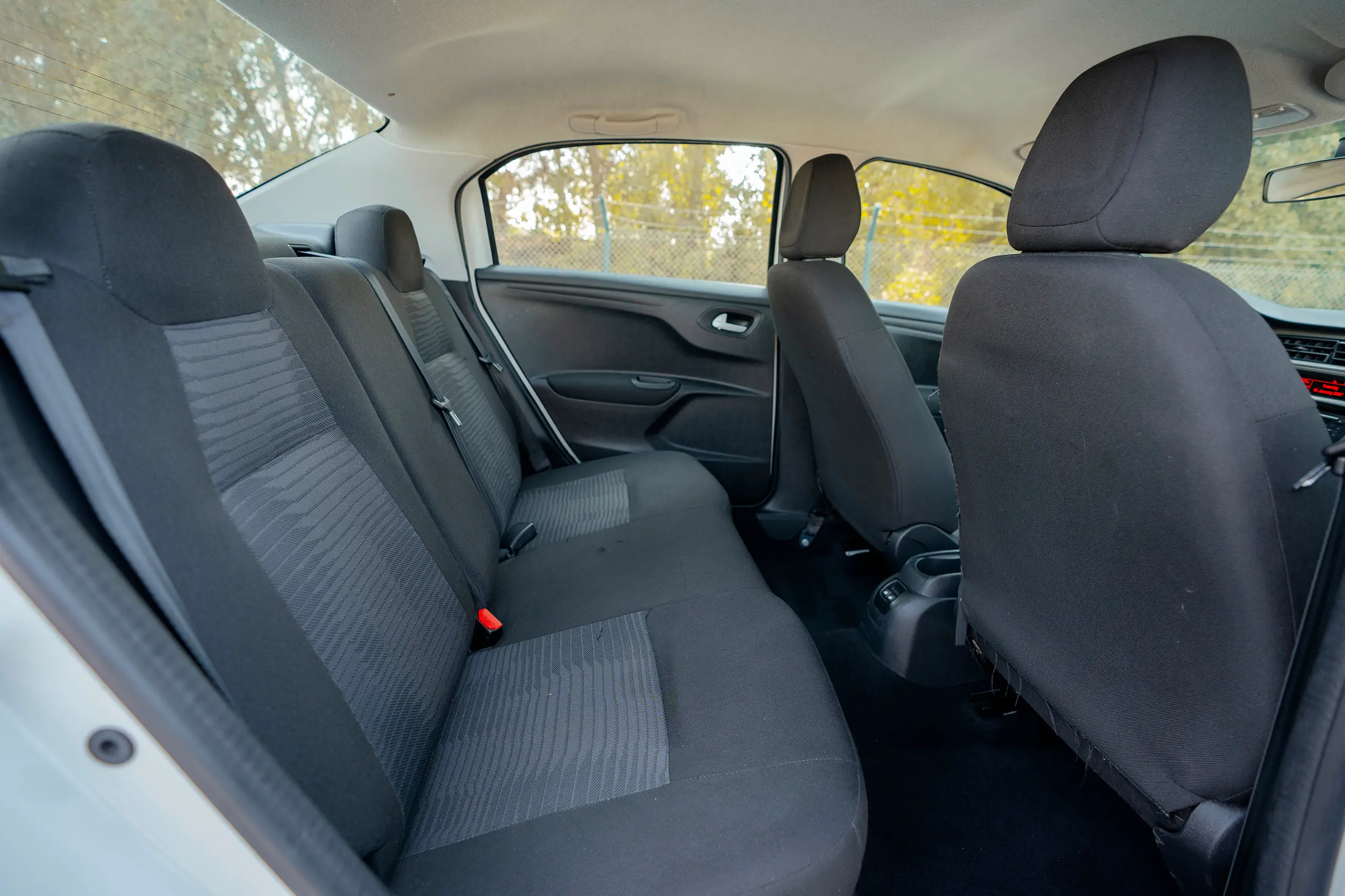 Used 2021 Peugeot 301 Allure in White – Rear Passenger Side Cabin View for Sale at First Choice Cars Dubai Sharjah