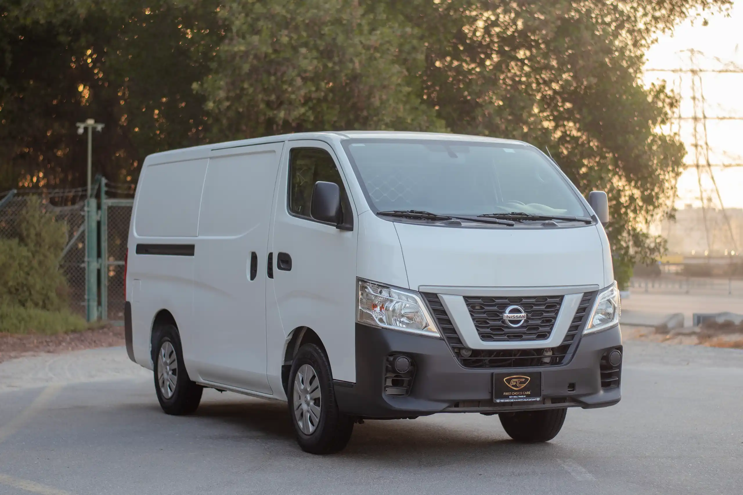 Used 2021 Nissan Urvan Standard Roof White – Right Front Diagonal (45°) View at First Choice Cars Sharjah