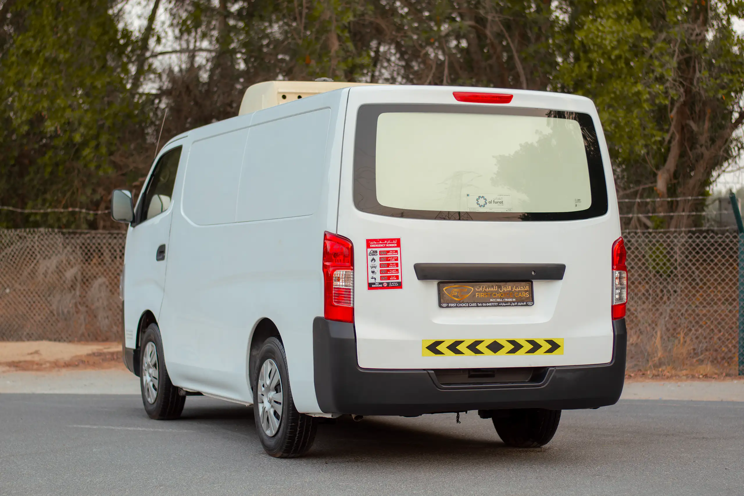 Used 2021 Nissan Urvan Standard Roof White – Left Back Diagonal (45°) View at First Choice Cars Sharjah