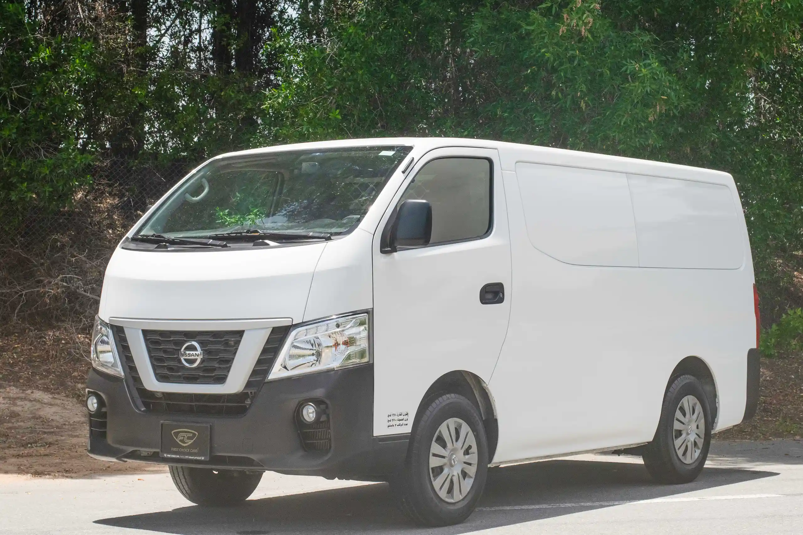 Used 2021 Nissan Urvan Standard Roof White – Left Front Diagonal (45°) View at First Choice Cars Sharjah