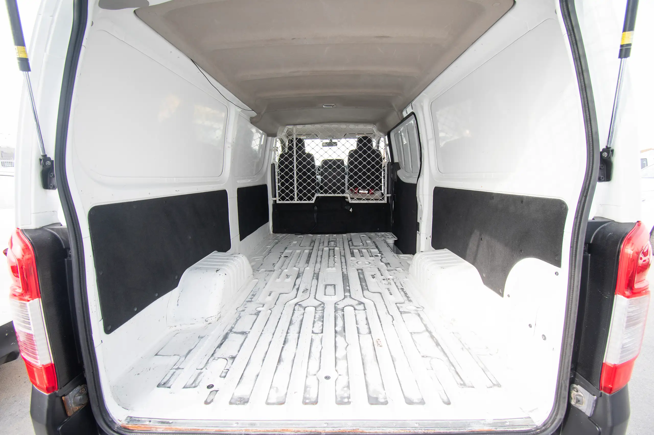 Used 2021 Nissan Urvan Standard Roof White – Delivery Box Rear Opening View at First Choice Cars Sharjah