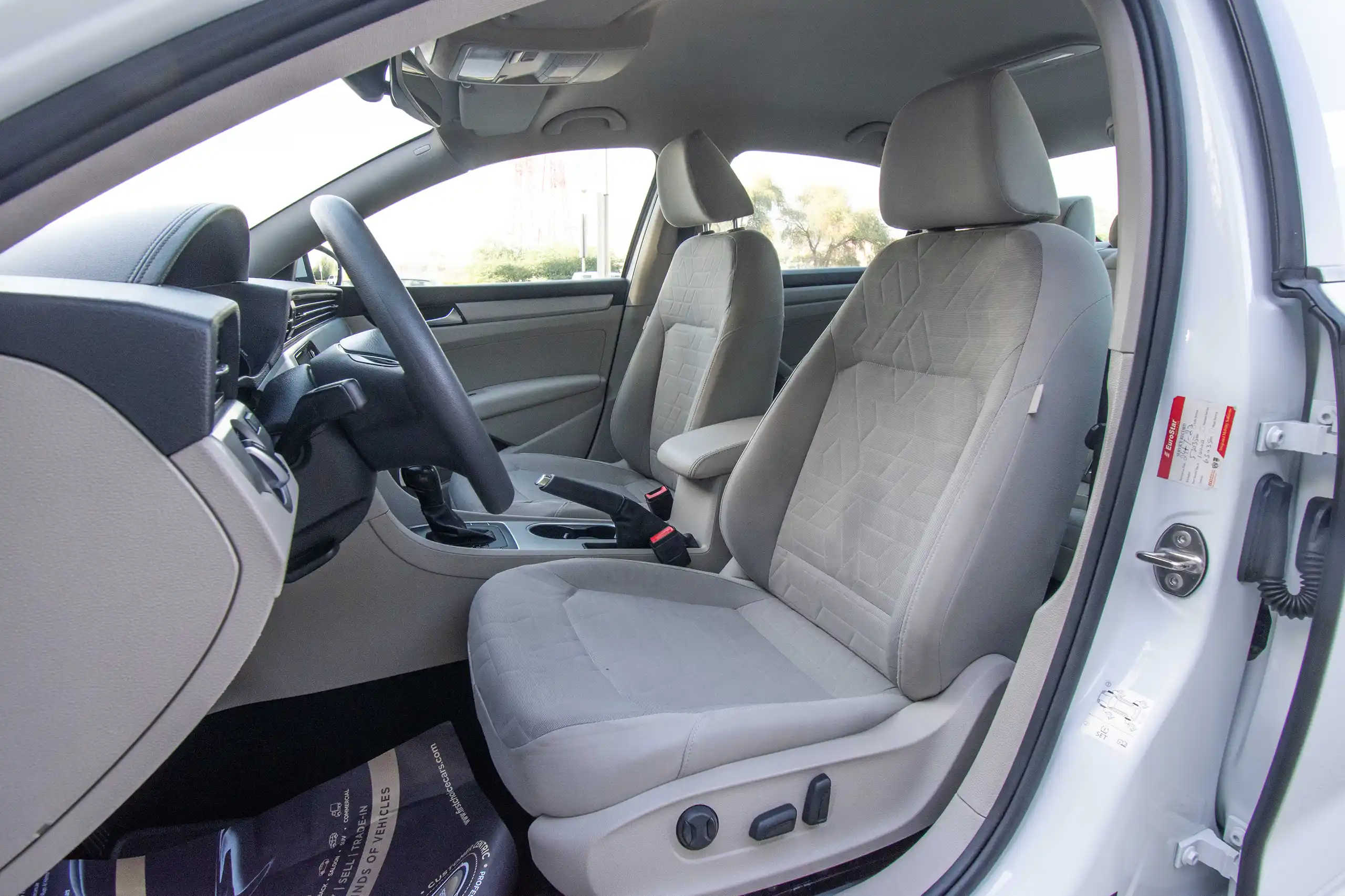 Used 2020 Volkswagen Passat Trendline in White – Front Driver Side Cabin View for Sale at First Choice Cars Dubai Sharjah