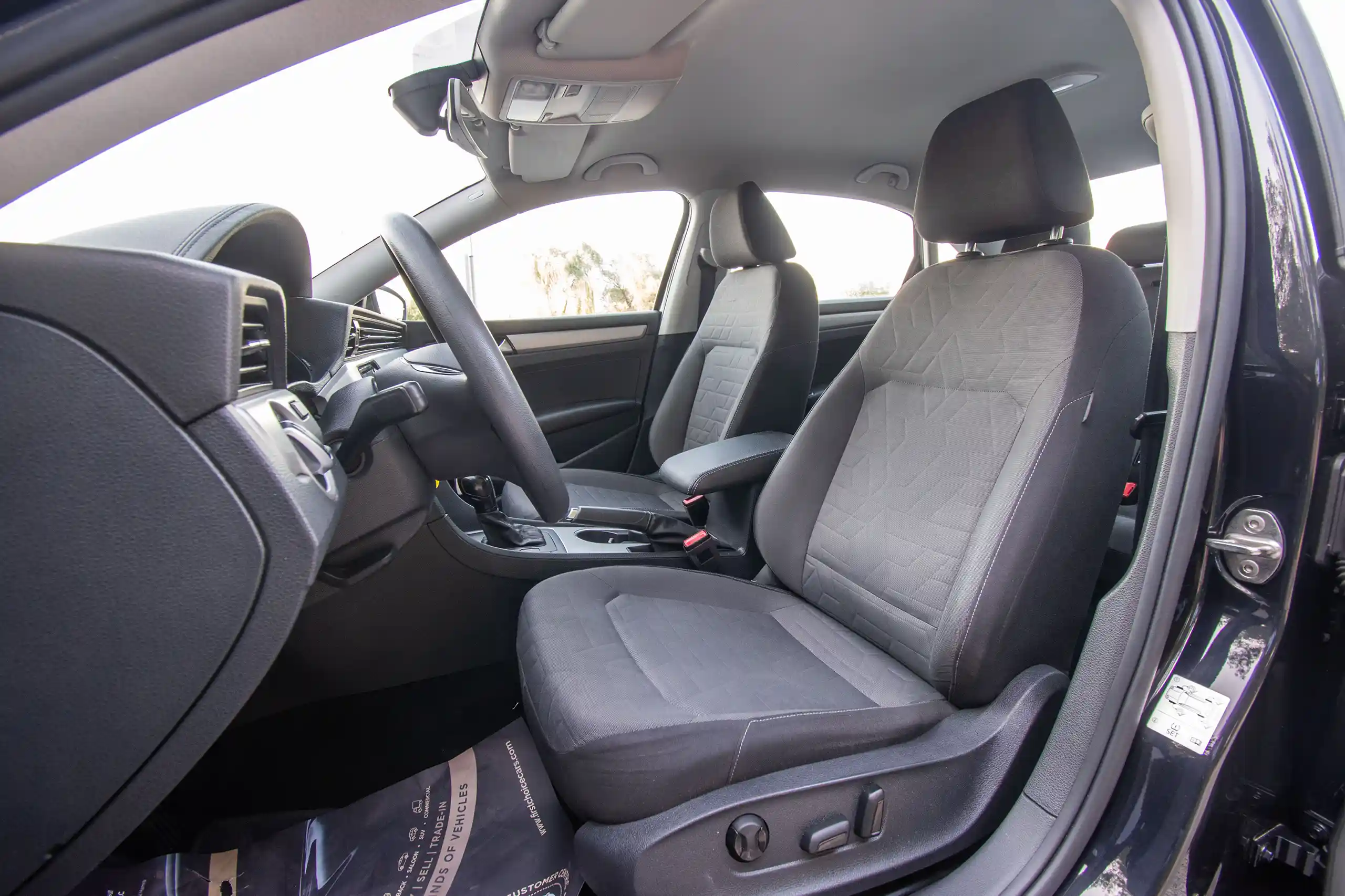 Used 2020 Volkswagen Passat Trendline in Black – Front Driver Side Cabin View for Sale at First Choice Cars Dubai Sharjah