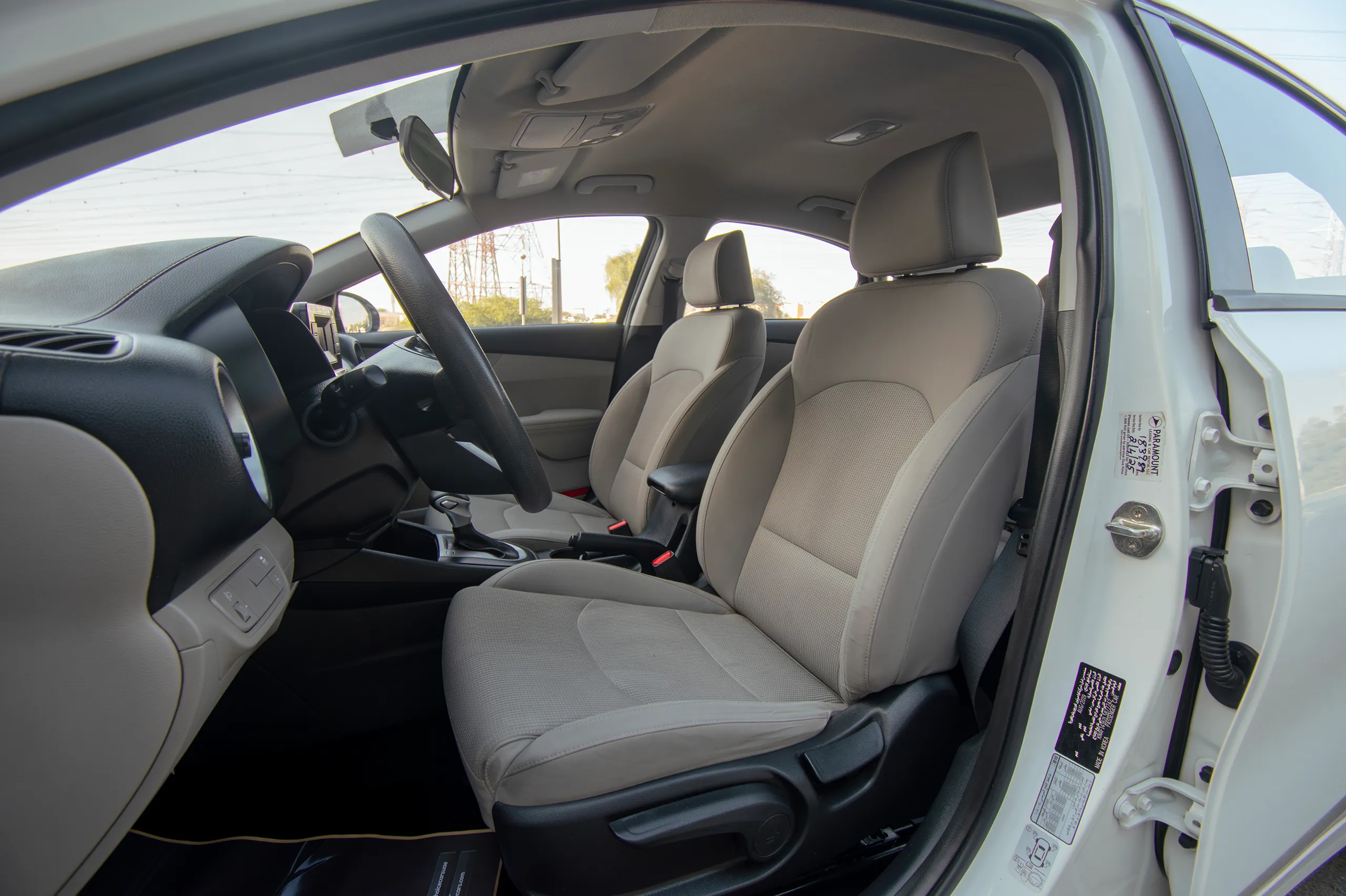 Used 2020 KIA Cerato LX White – Front Driver Side Cabin View at First Choice Cars Sharjah