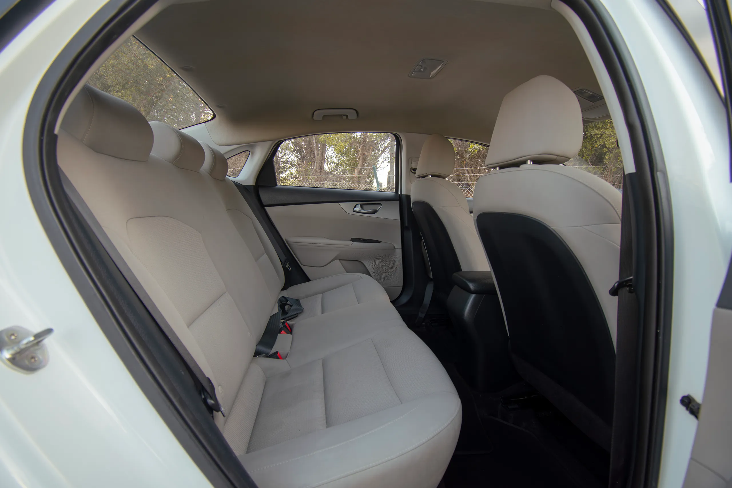 Used 2020 KIA Cerato LX White – Rear Passenger Side Cabin View at First Choice Cars Sharjah