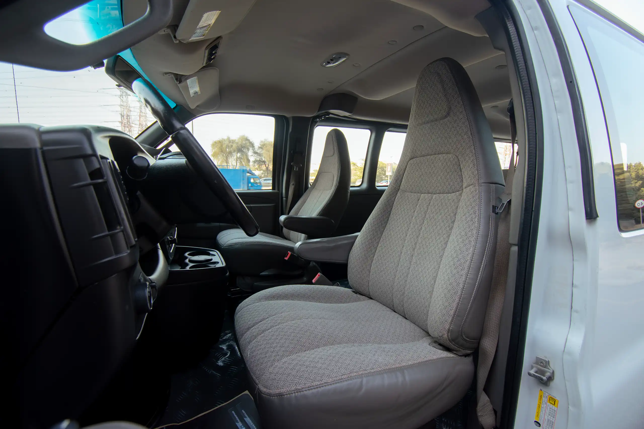Used 2019 GMC Savana 3500 White – Front Driver Side Cabin View at First Choice Cars Sharjah