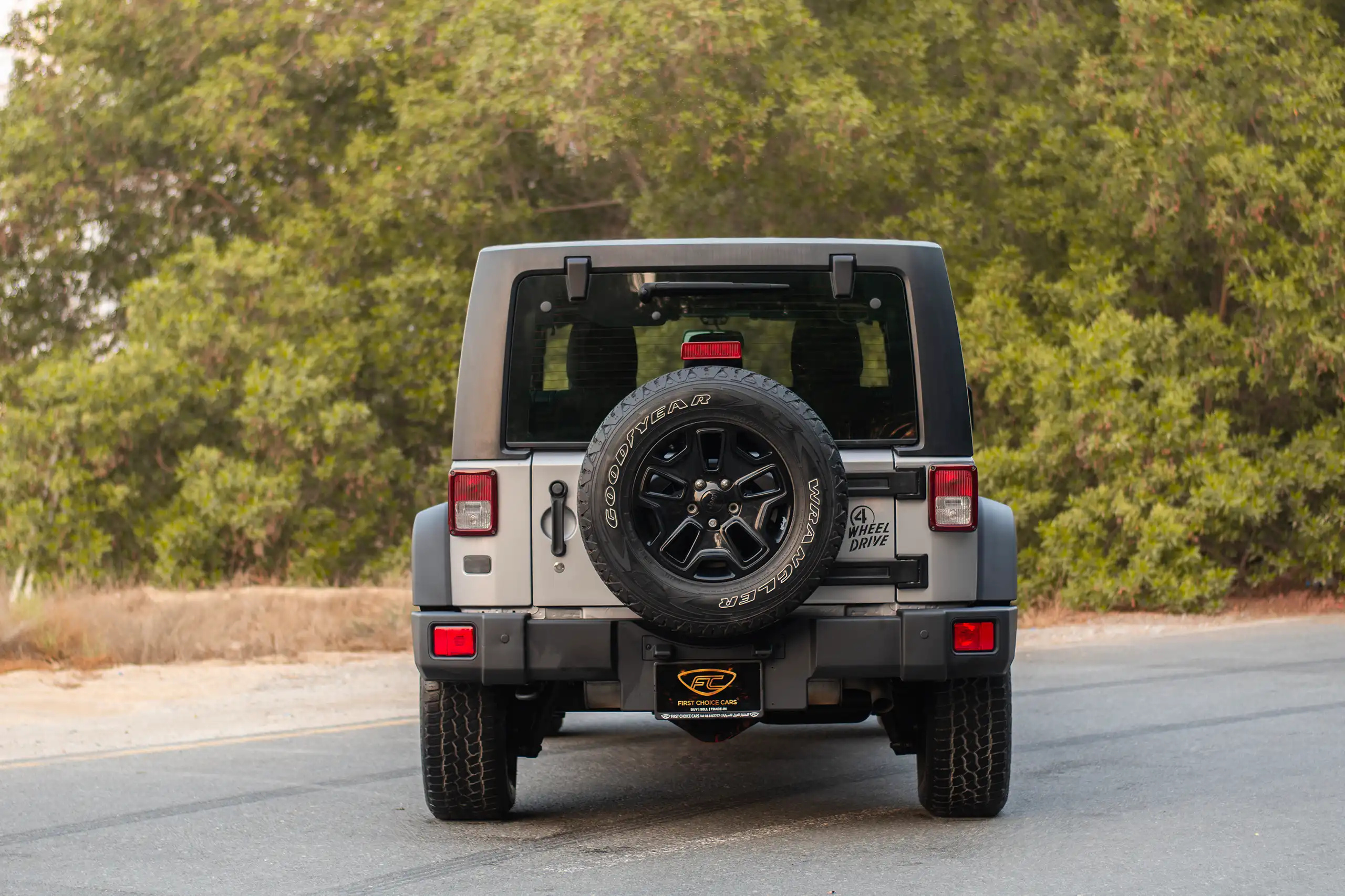 Used 2018 Jeep Wrangler Unlimited Willys Wheeler in Silver – Back/Rear View for Sale at First Choice Cars Dubai Sharjah
