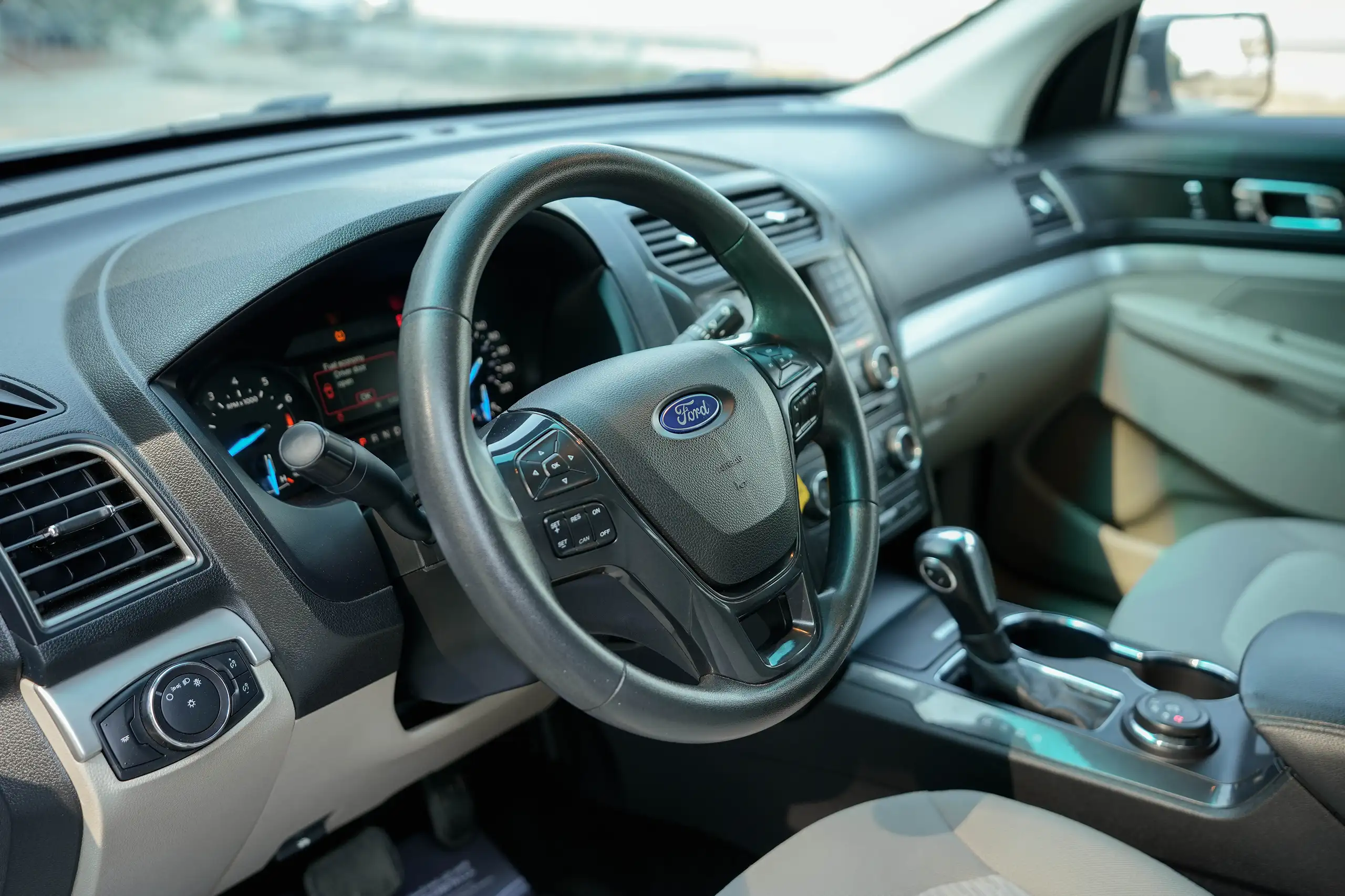 Used 2018 Ford Explorer XLT in White – Driver Side Dashboard & Steering View for Sale at First Choice Cars Dubai Sharjah