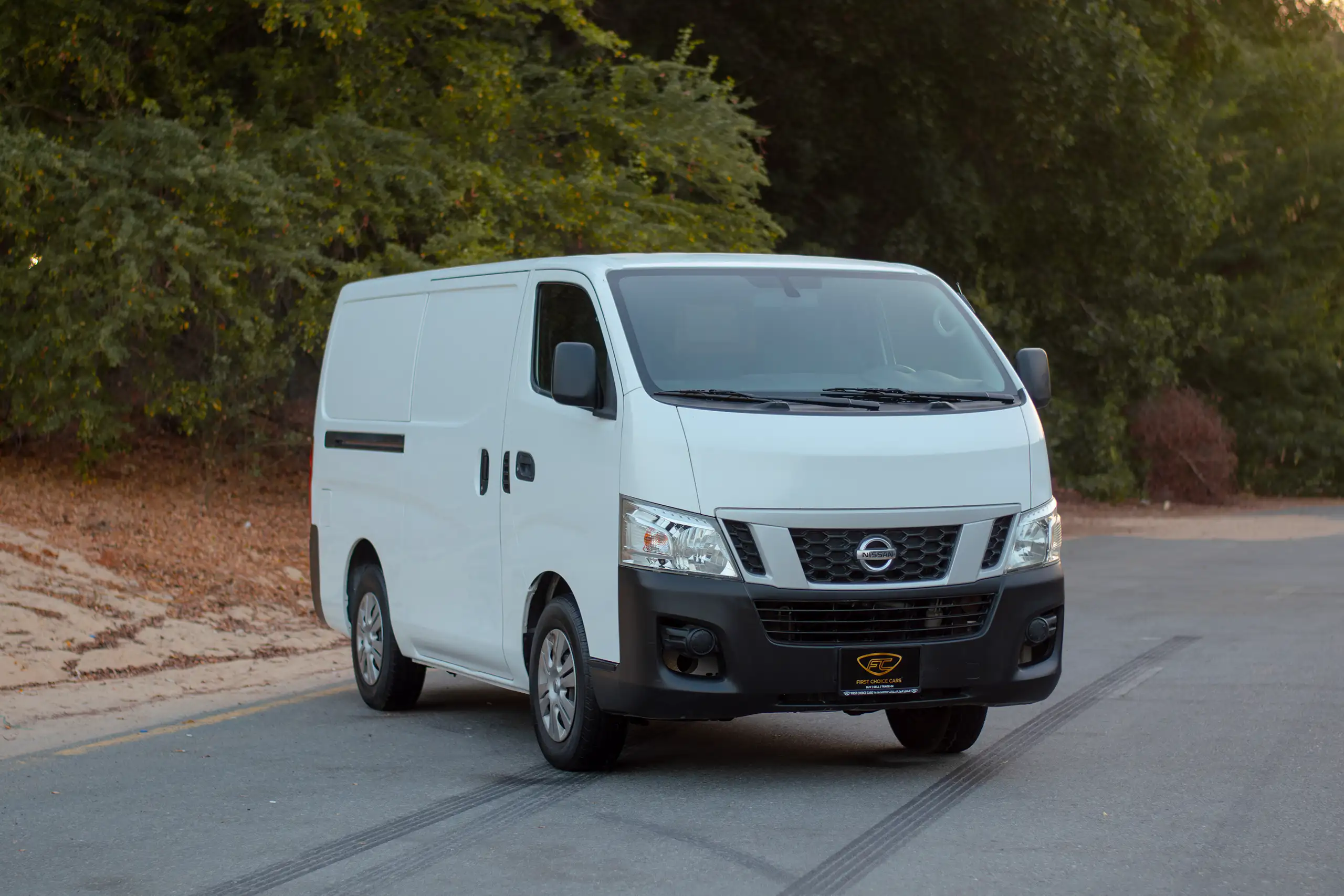 Used 2016 Nissan Urvan Standard Roof White – Right Front Diagonal (45°) View at First Choice Cars Sharjah