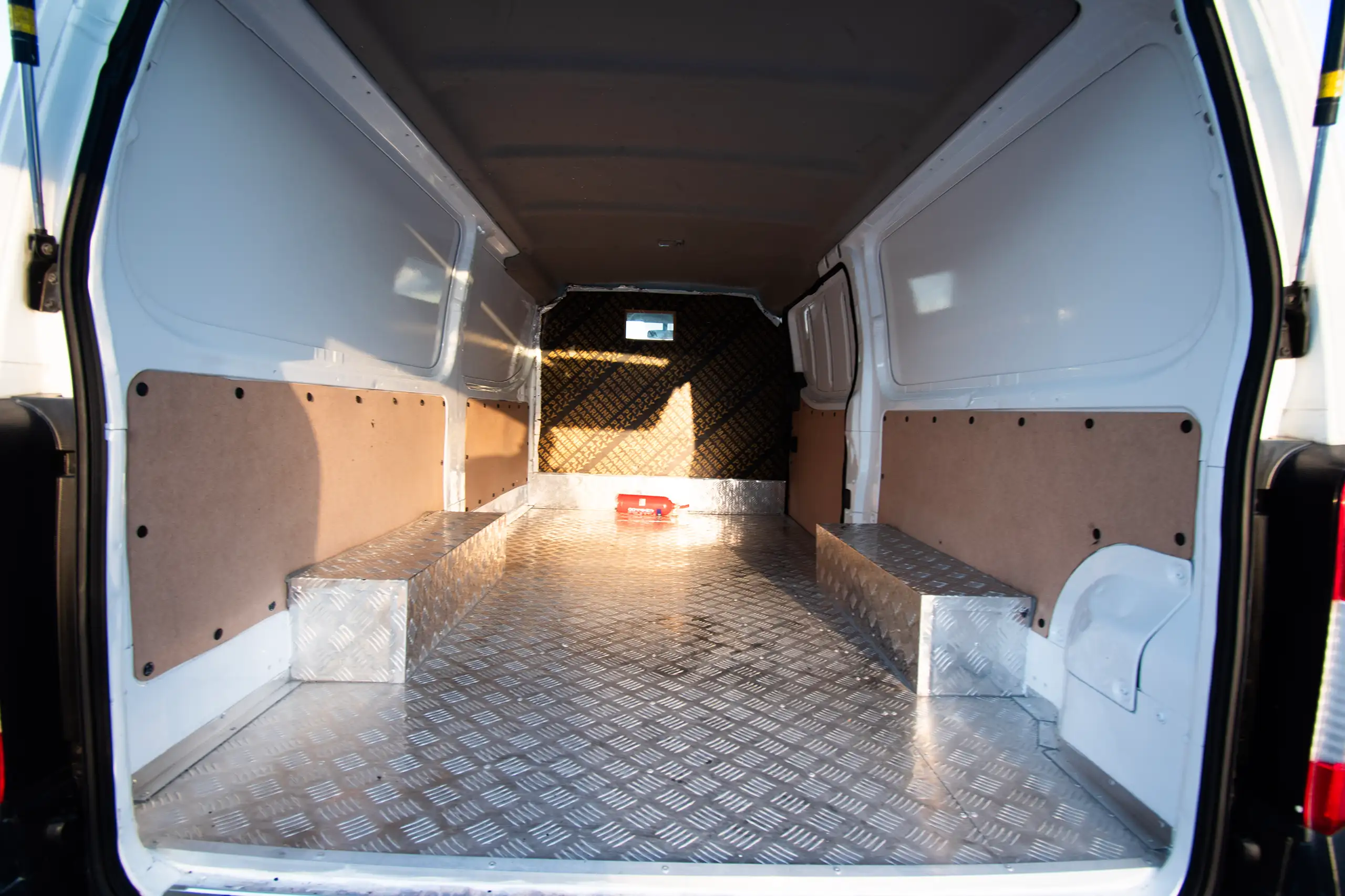 Used 2016 Nissan Urvan Standard Roof White – Delivery Box Rear Opening View at First Choice Cars Sharjah