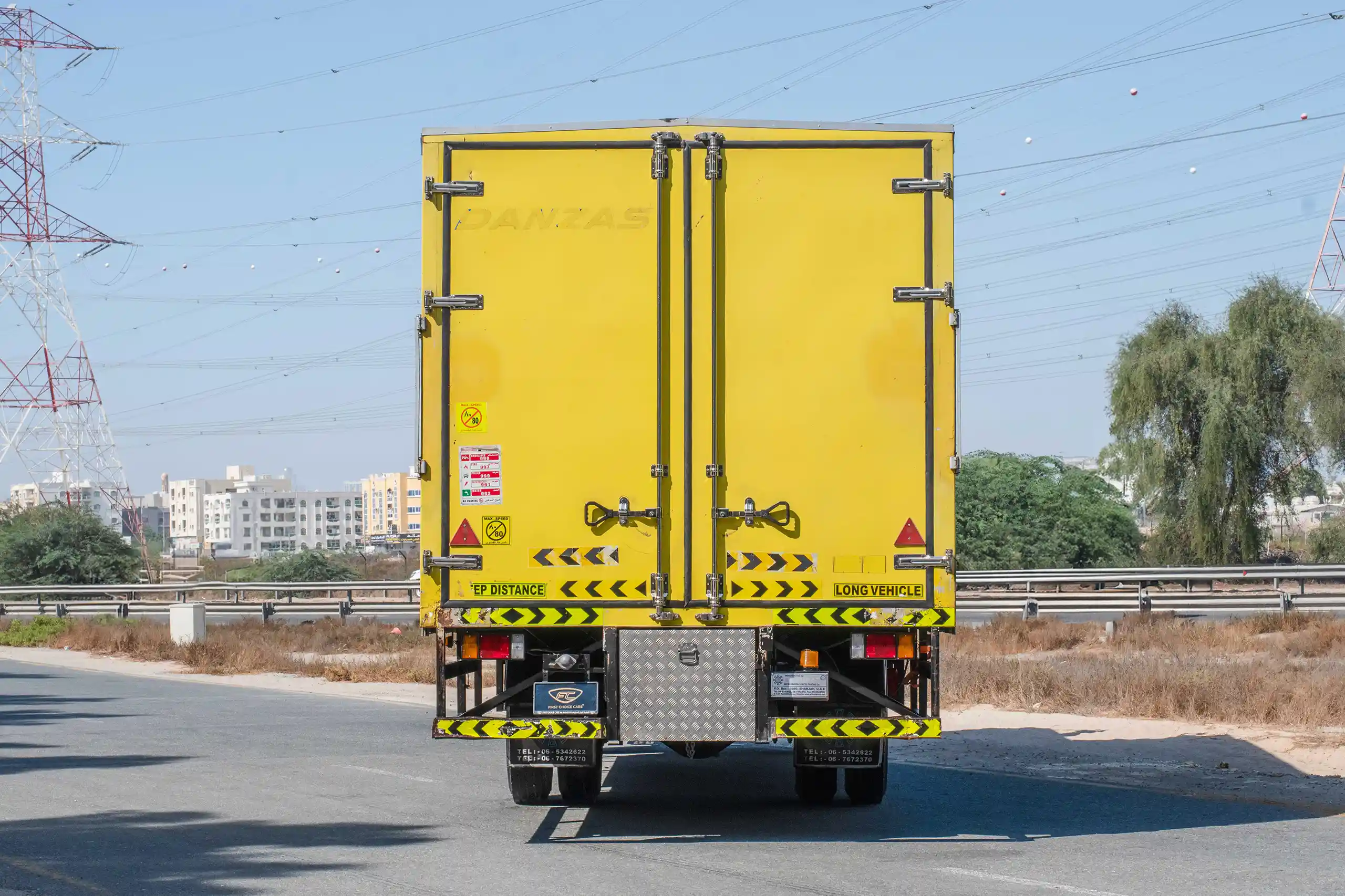 Used 2016 Isuzu FSR Cargo Body in Yellow – Back/Rear View for Sale at First Choice Cars Dubai Sharjah