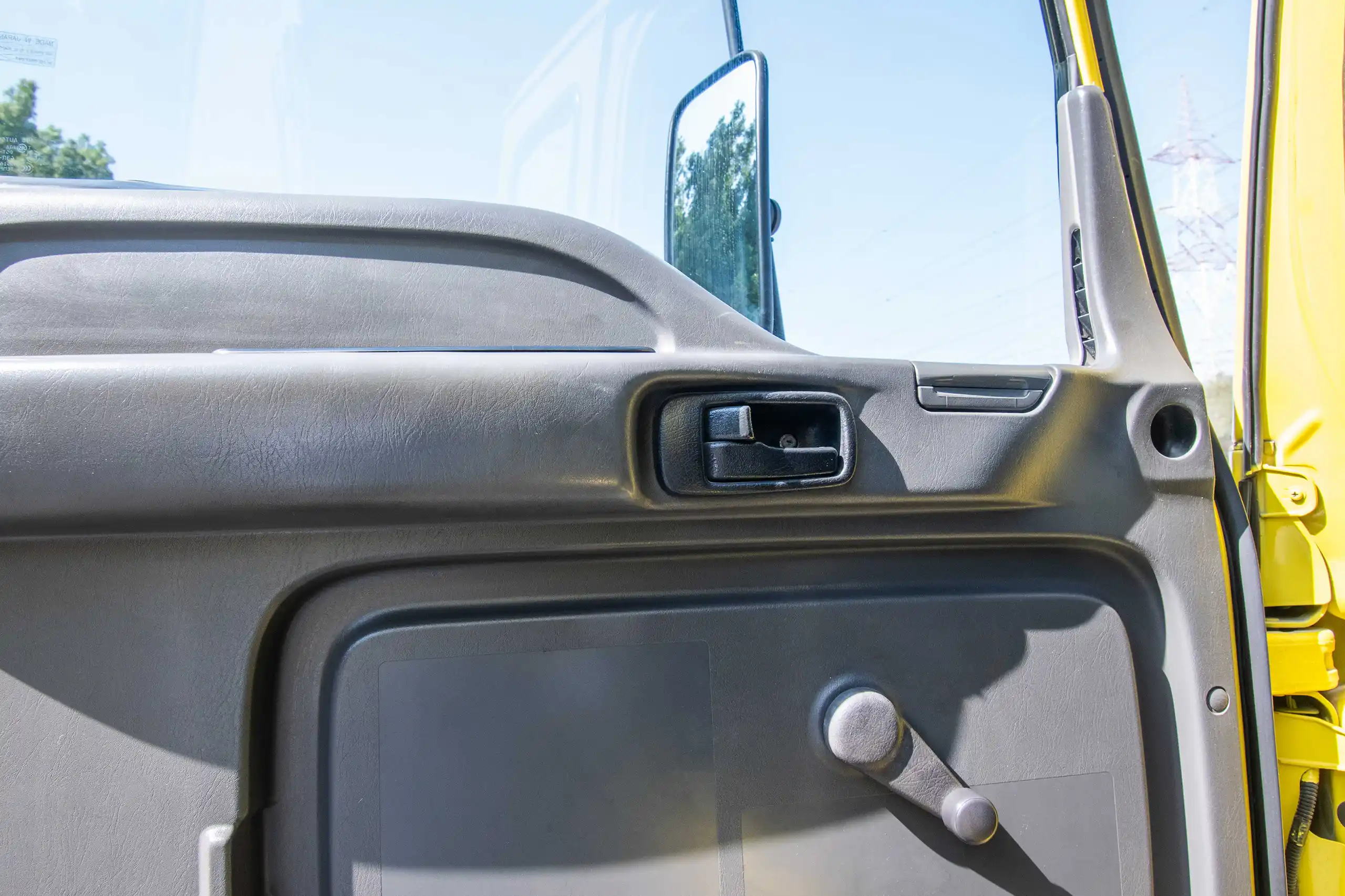 Used 2016 Isuzu FSR Cargo Body in Yellow – Driver Door Panel Full View for Sale at First Choice Cars Dubai Sharjah
