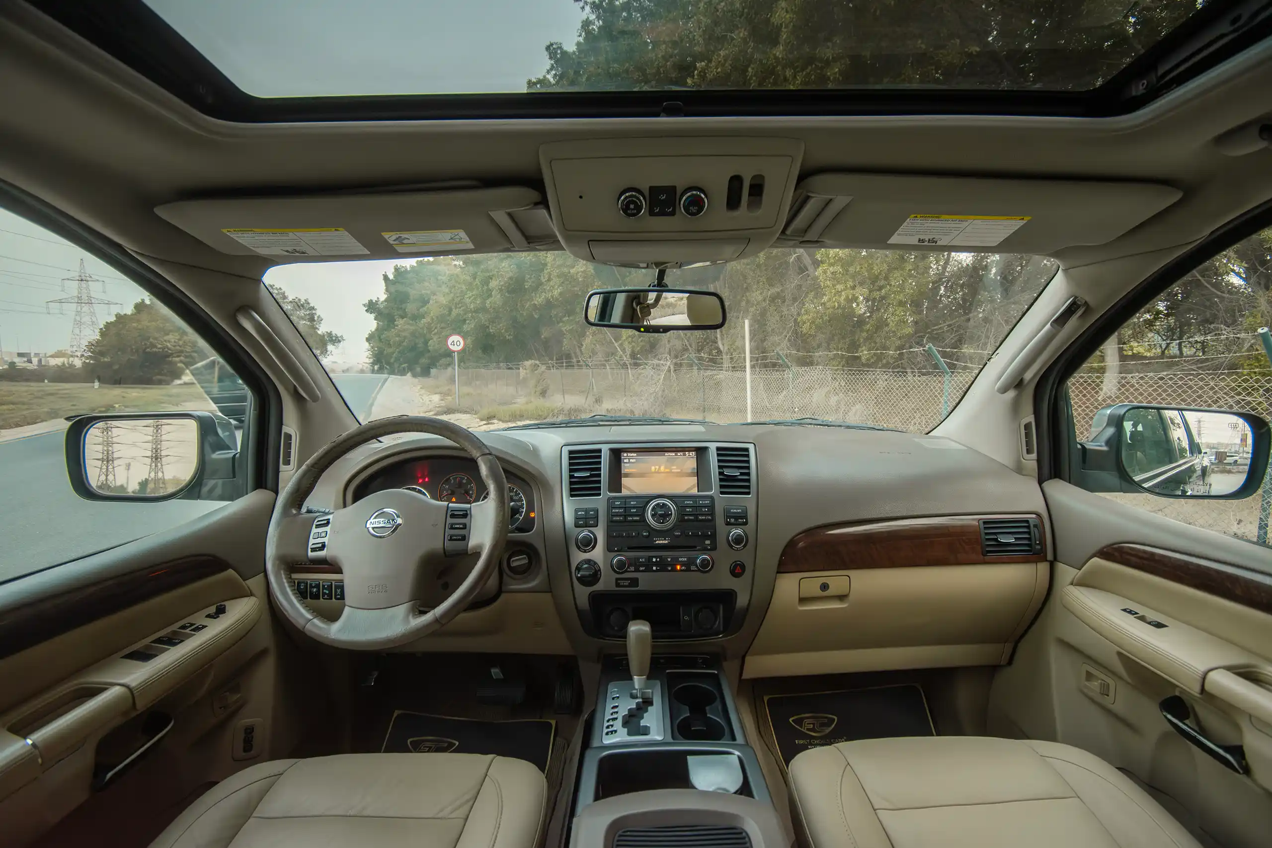 Used 2010 Nissan Armada LE Grey – Front Cabin / Dashboard Full View at First Choice Cars Sharjah