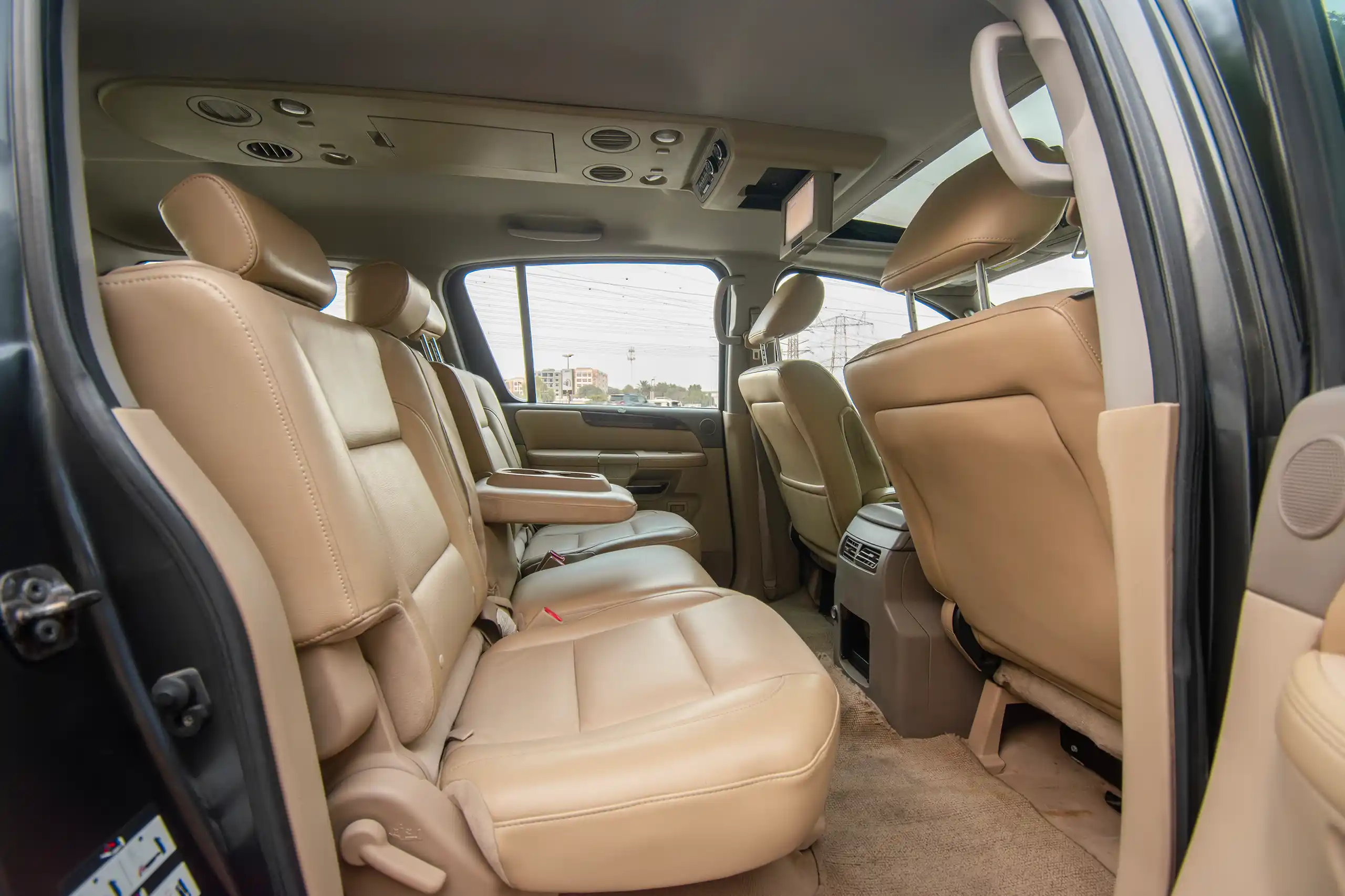 Used 2010 Nissan Armada LE Grey – Rear Passenger Side Cabin View at First Choice Cars Sharjah