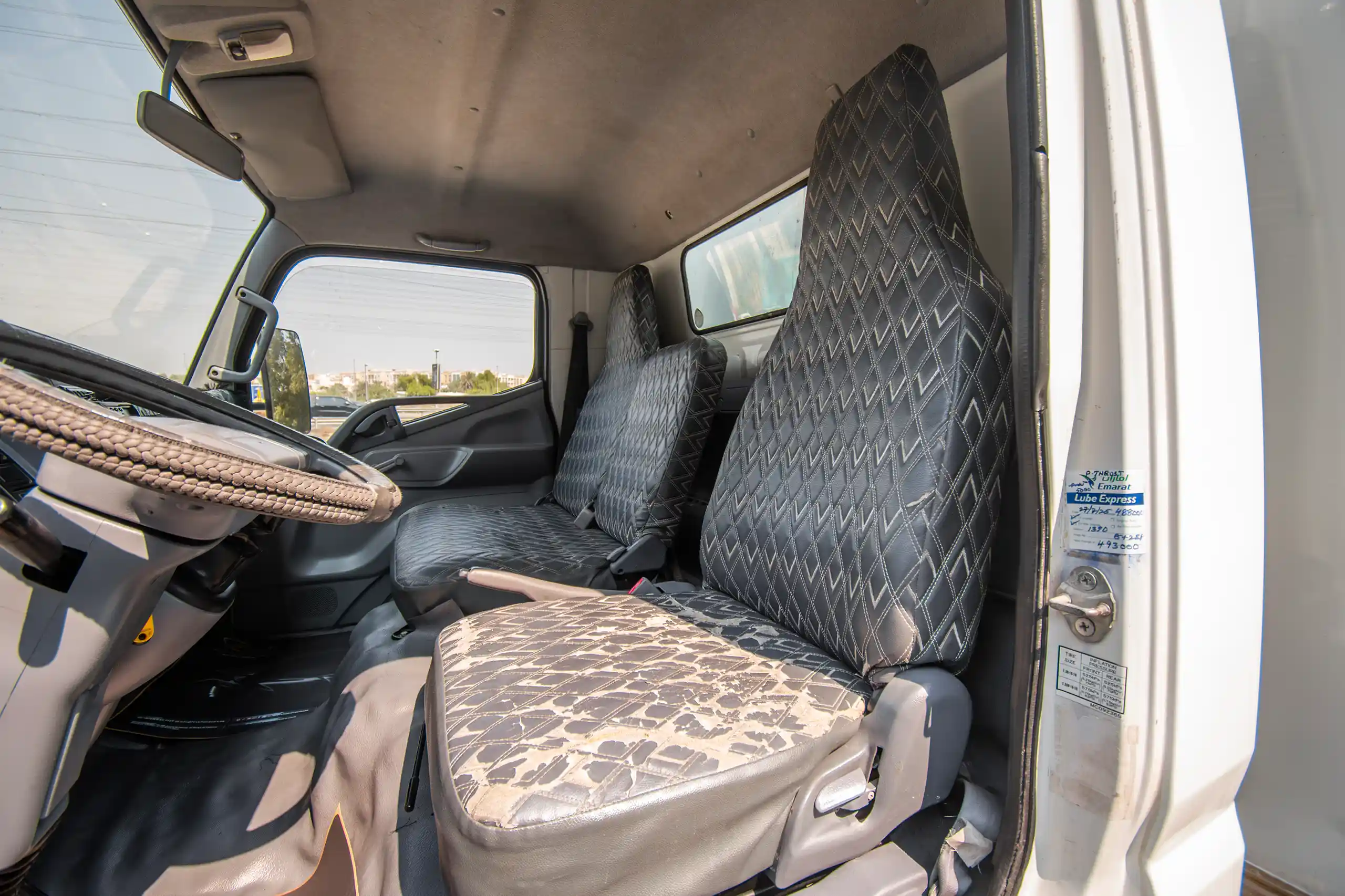 Used 2008 Mitsubishi Canter Cargo Box in White – Front Driver Side Cabin View for Sale at First Choice Cars Dubai Sharjah
