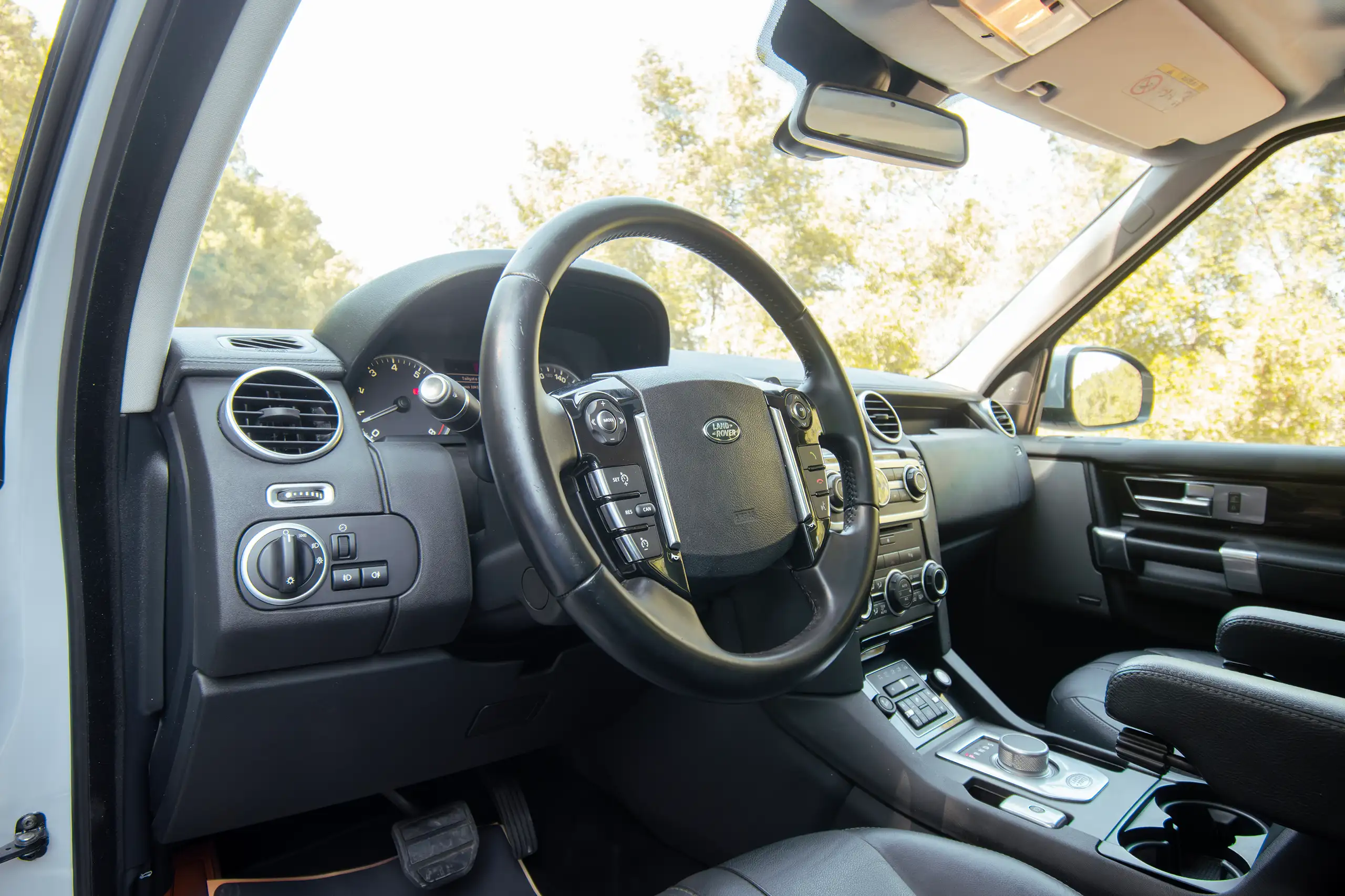 Used 2016 Land Rover LR4 HSE Silver – Driver Side Dashboard & Steering View at First Choice Cars Sharjah