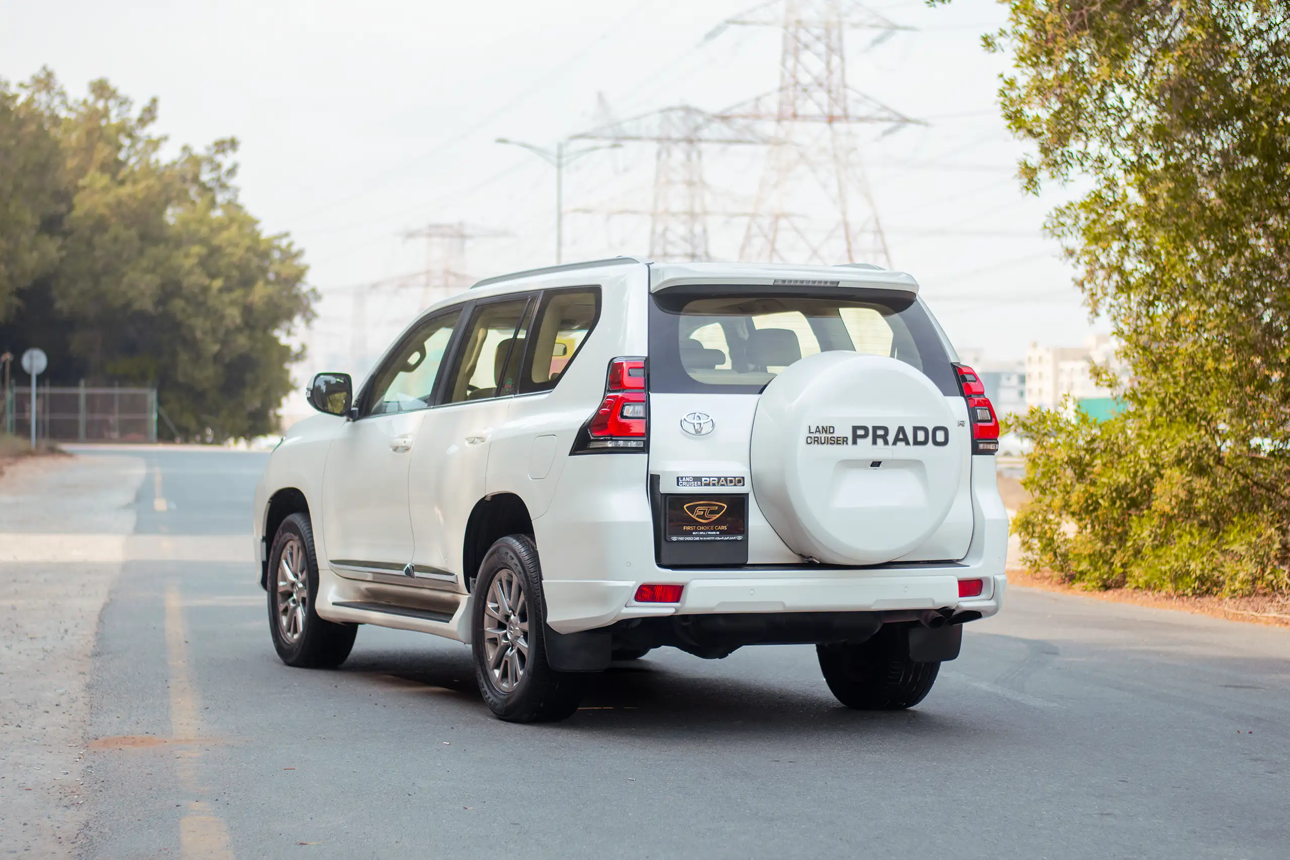 Used 2020 Toyota Prado VXR White – Left Back Diagonal (45°) View at First Choice Cars Sharjah