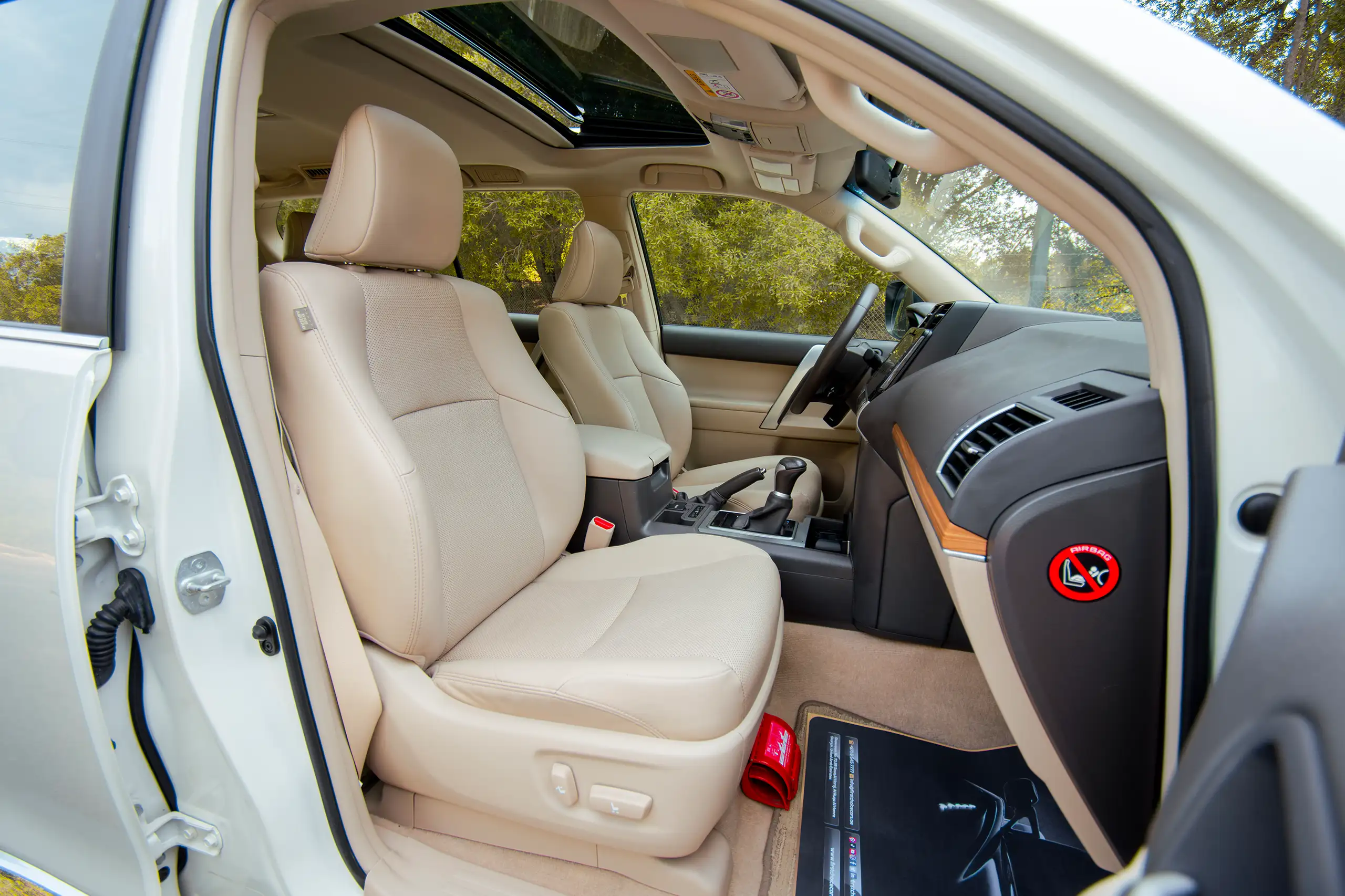 Used 2020 Toyota Prado VXR White – Front Passenger Side Cabin View at First Choice Cars Sharjah