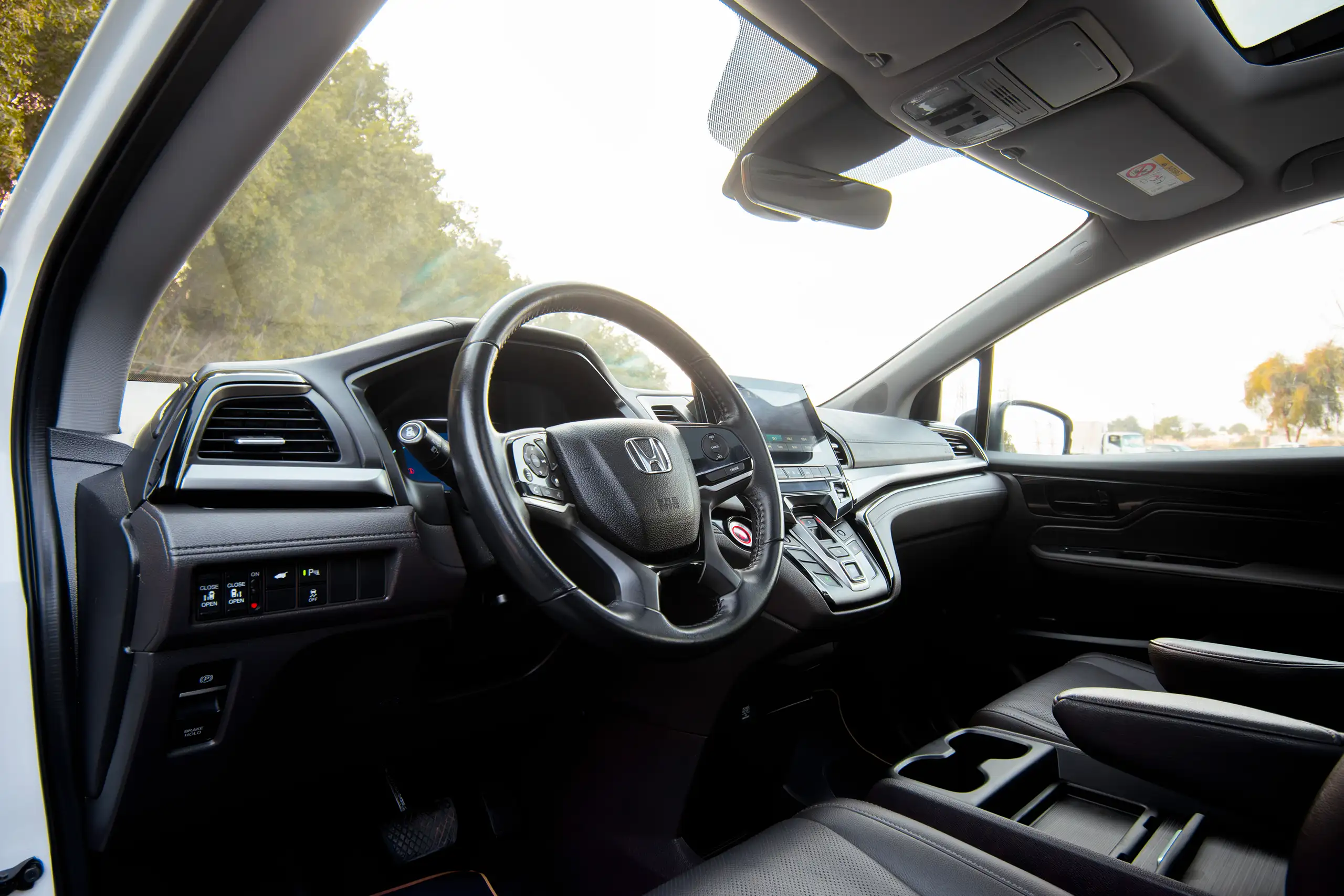 Used 2021 Honda Odyssey EX White – Driver Side Dashboard & Steering View at First Choice Cars Sharjah