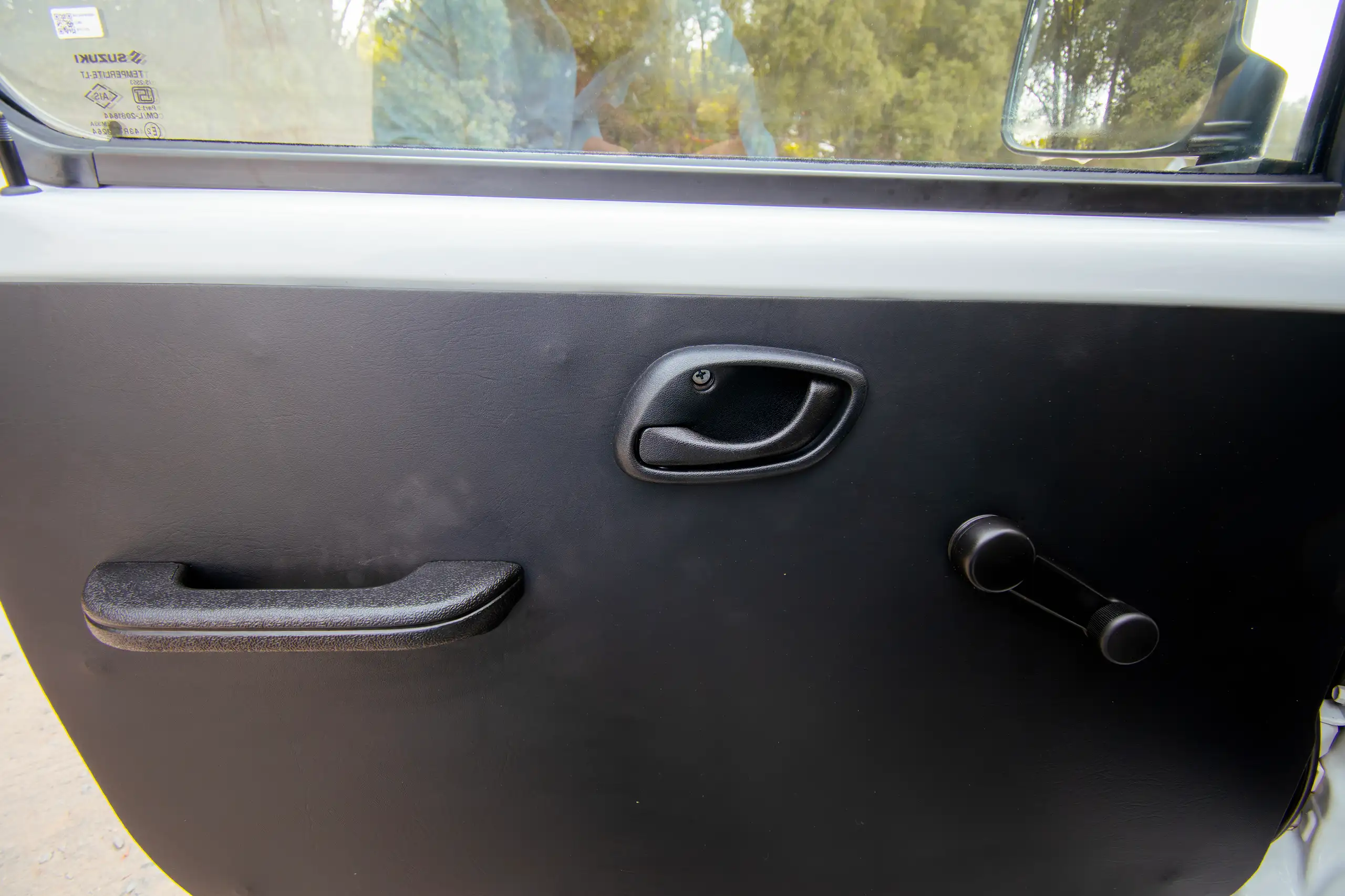 Used 2023 Suzuki Eeco Cargo White – Driver Door Panel Full View at First Choice Cars Sharjah