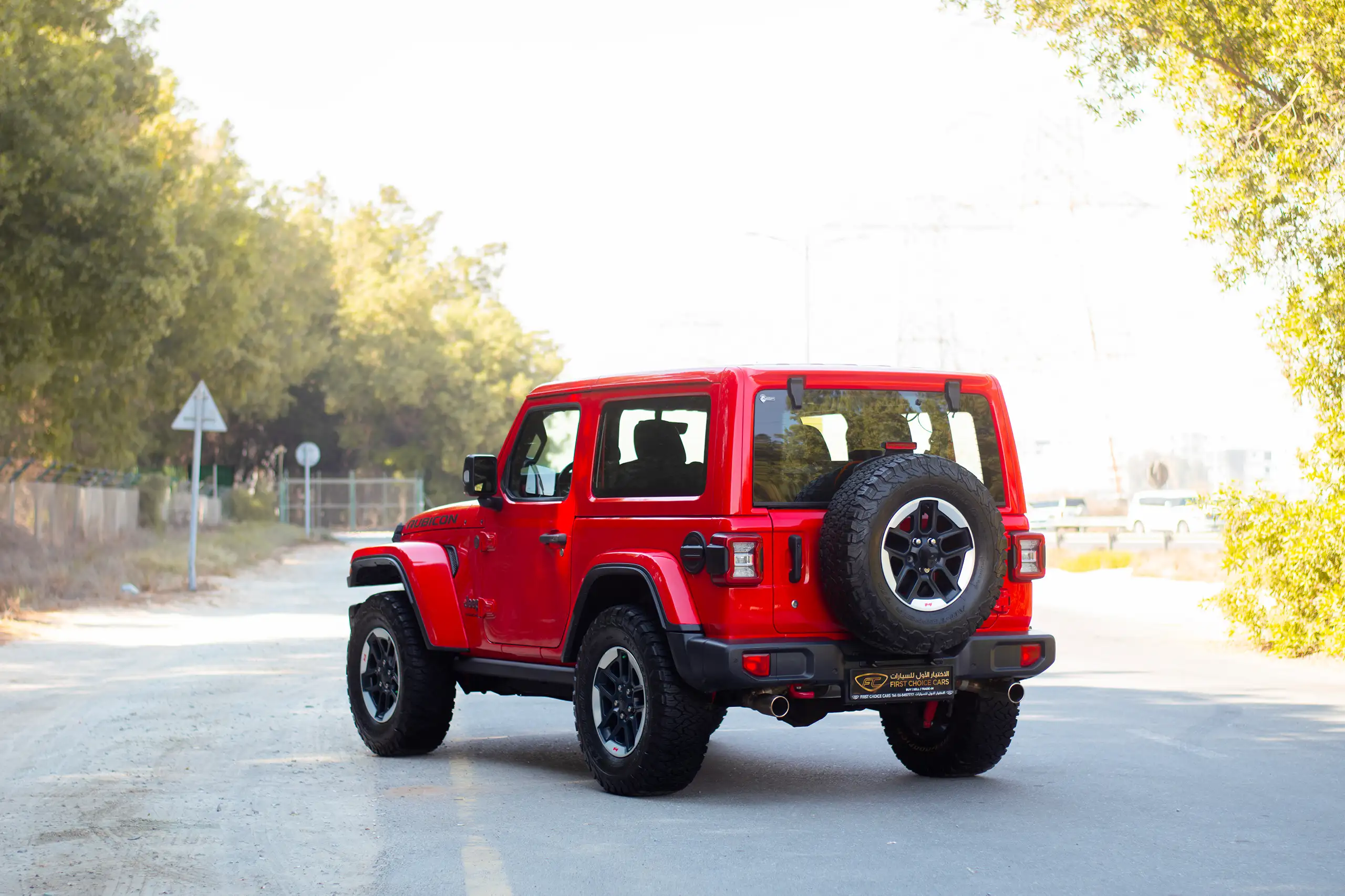 Used 2020 Jeep Wrangler Rubicon Red – Left Back Diagonal (45°) View at First Choice Cars Sharjah