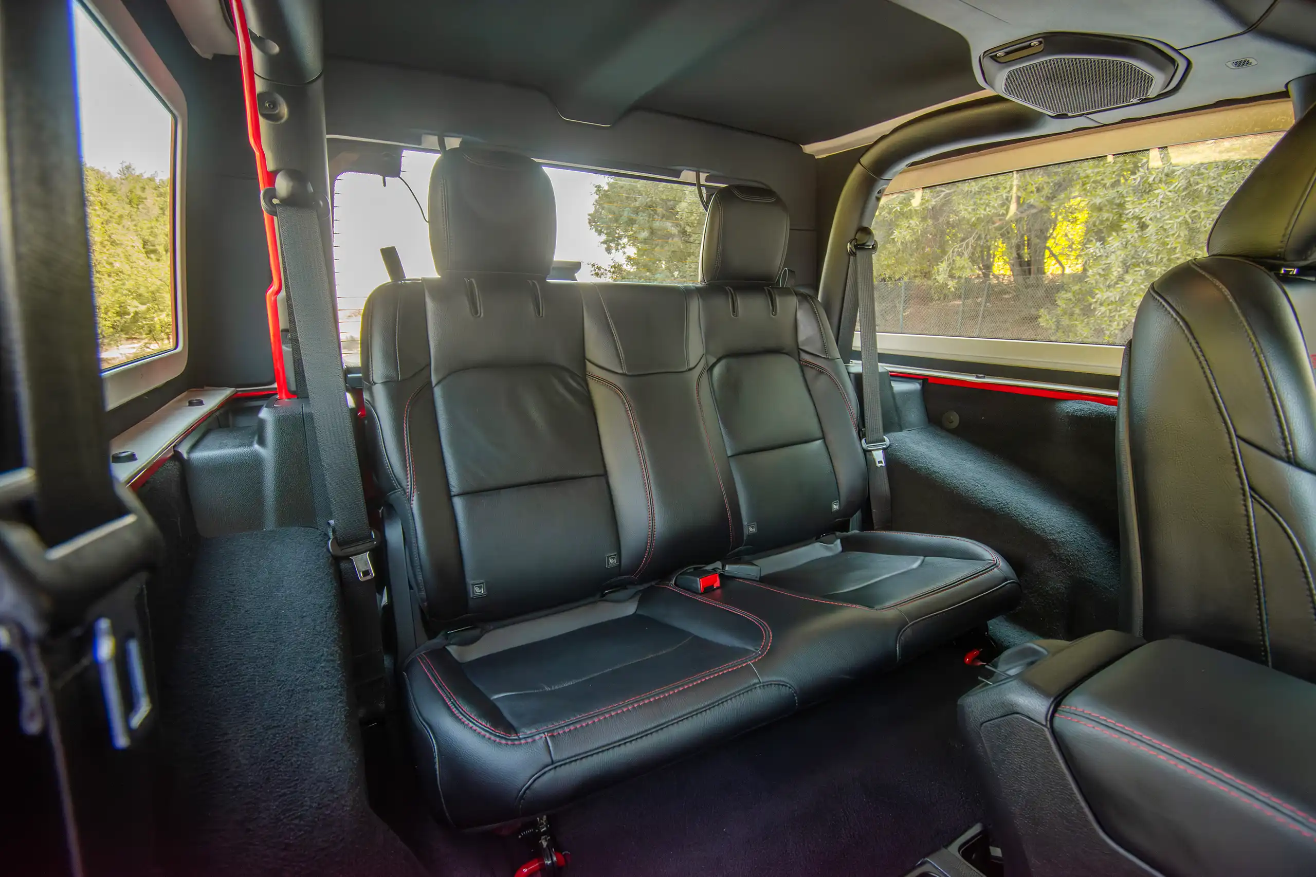 Used 2020 Jeep Wrangler Rubicon Red – Rear Passenger Side Cabin View at First Choice Cars Sharjah