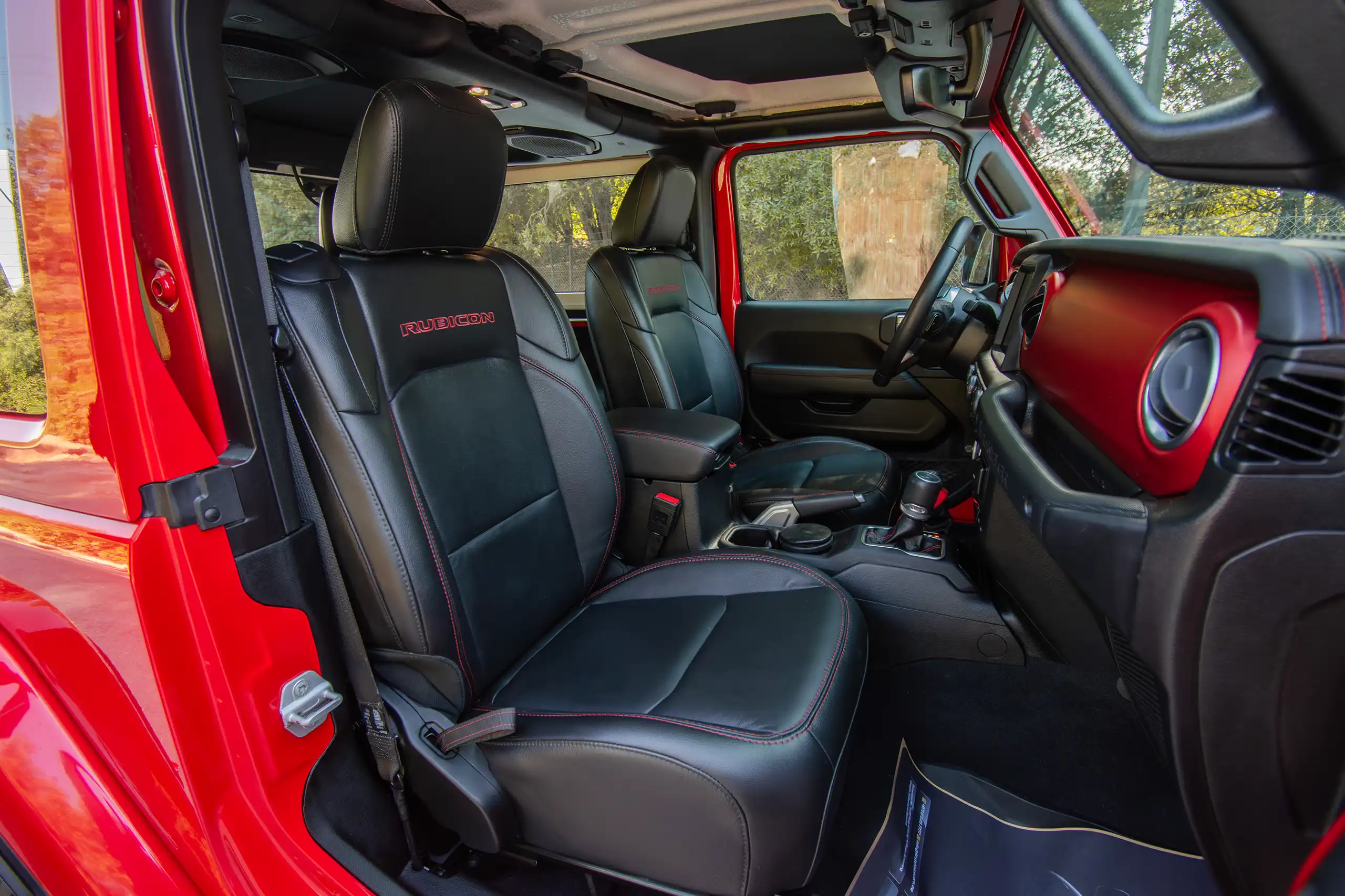 Used 2020 Jeep Wrangler Rubicon Red – Front Passenger Side Cabin View at First Choice Cars Sharjah