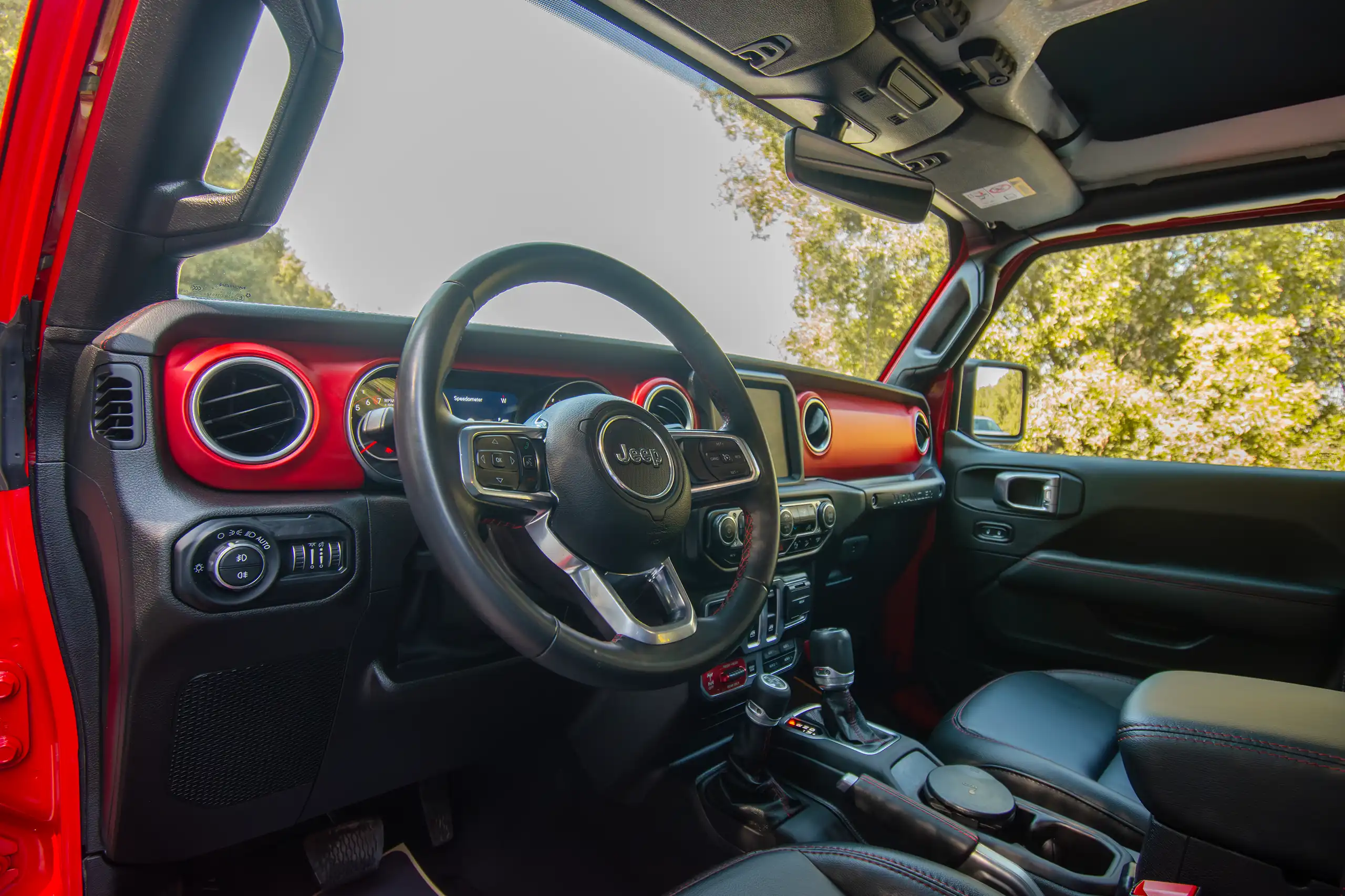 Used 2020 Jeep Wrangler Rubicon Red – Driver Side Dashboard & Steering View at First Choice Cars Sharjah