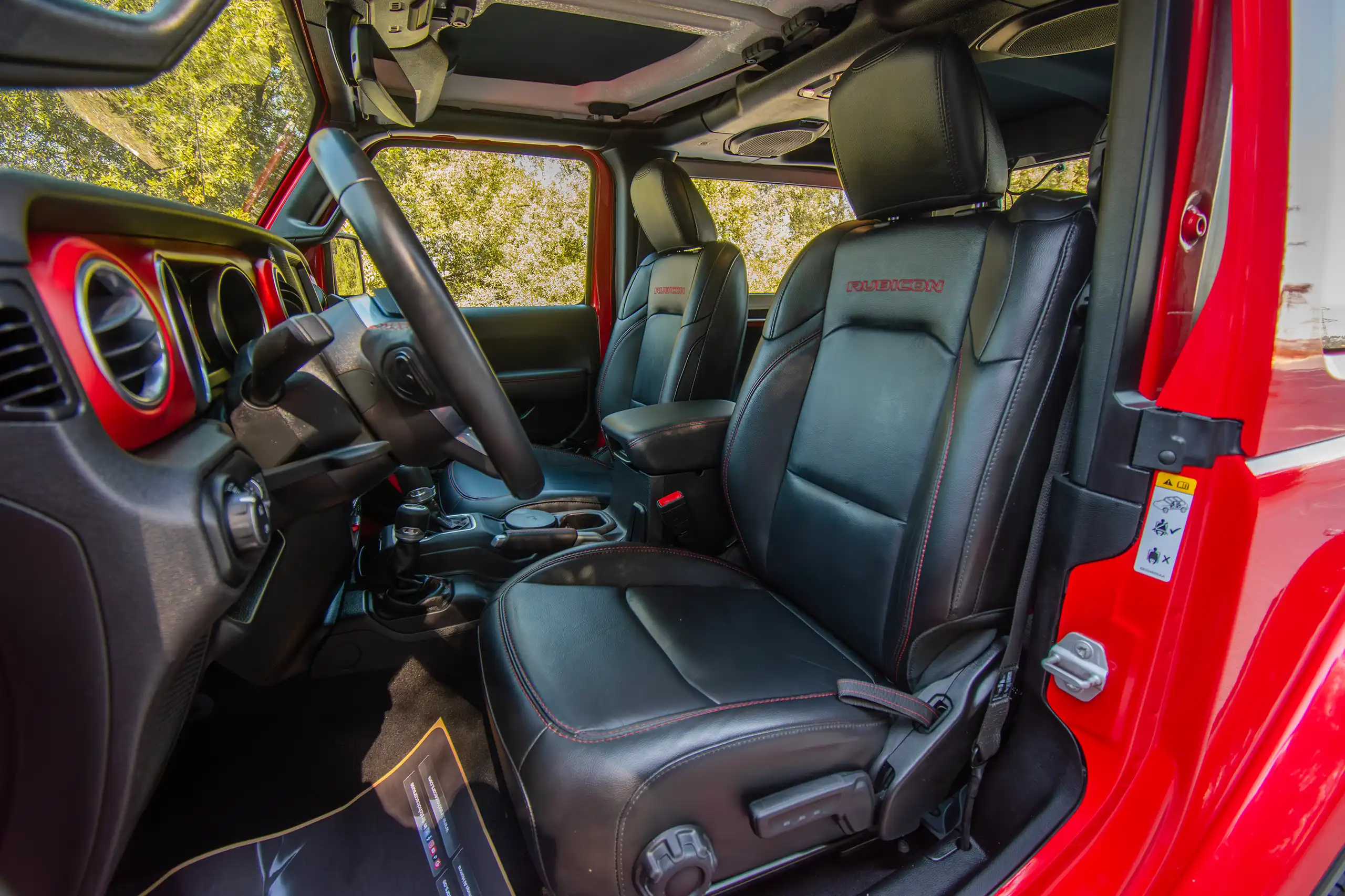 Used 2020 Jeep Wrangler Rubicon Red – Front Driver Side Cabin View at First Choice Cars Sharjah