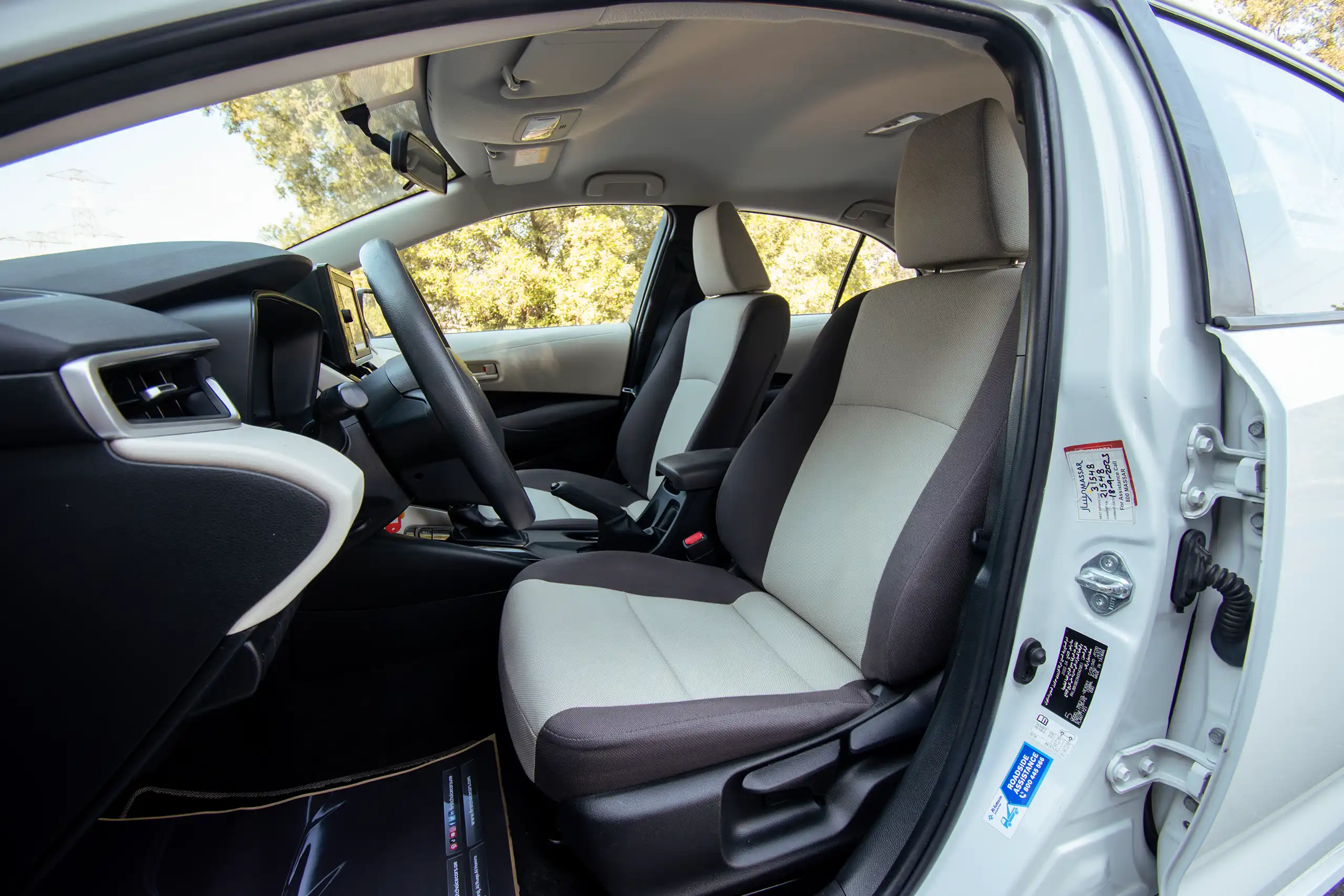 Used 2022 Toyota Corolla Xli White – Front Driver Side Cabin View at First Choice Cars Sharjah