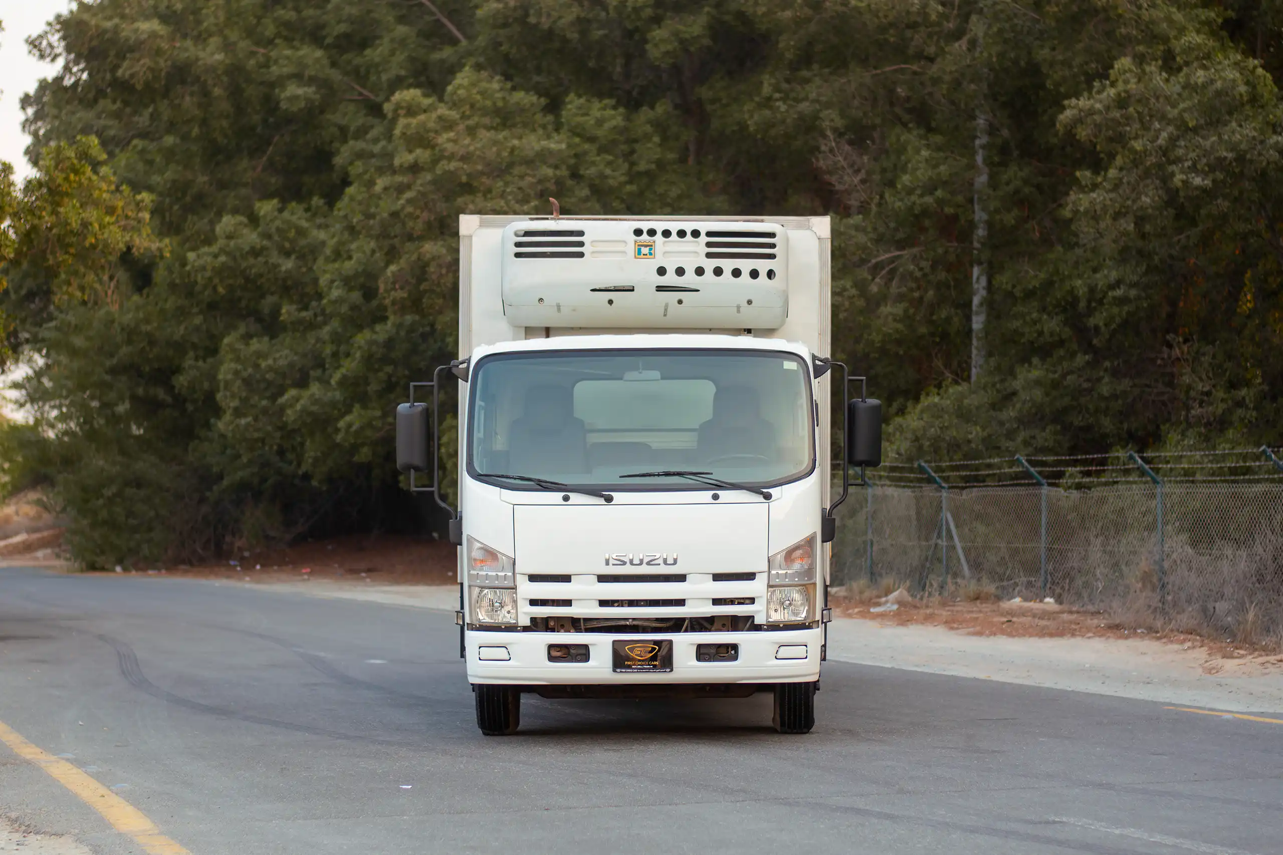 Used 2016 Isuzu NPR Freezer Box White – Front View at First Choice Cars Sharjah