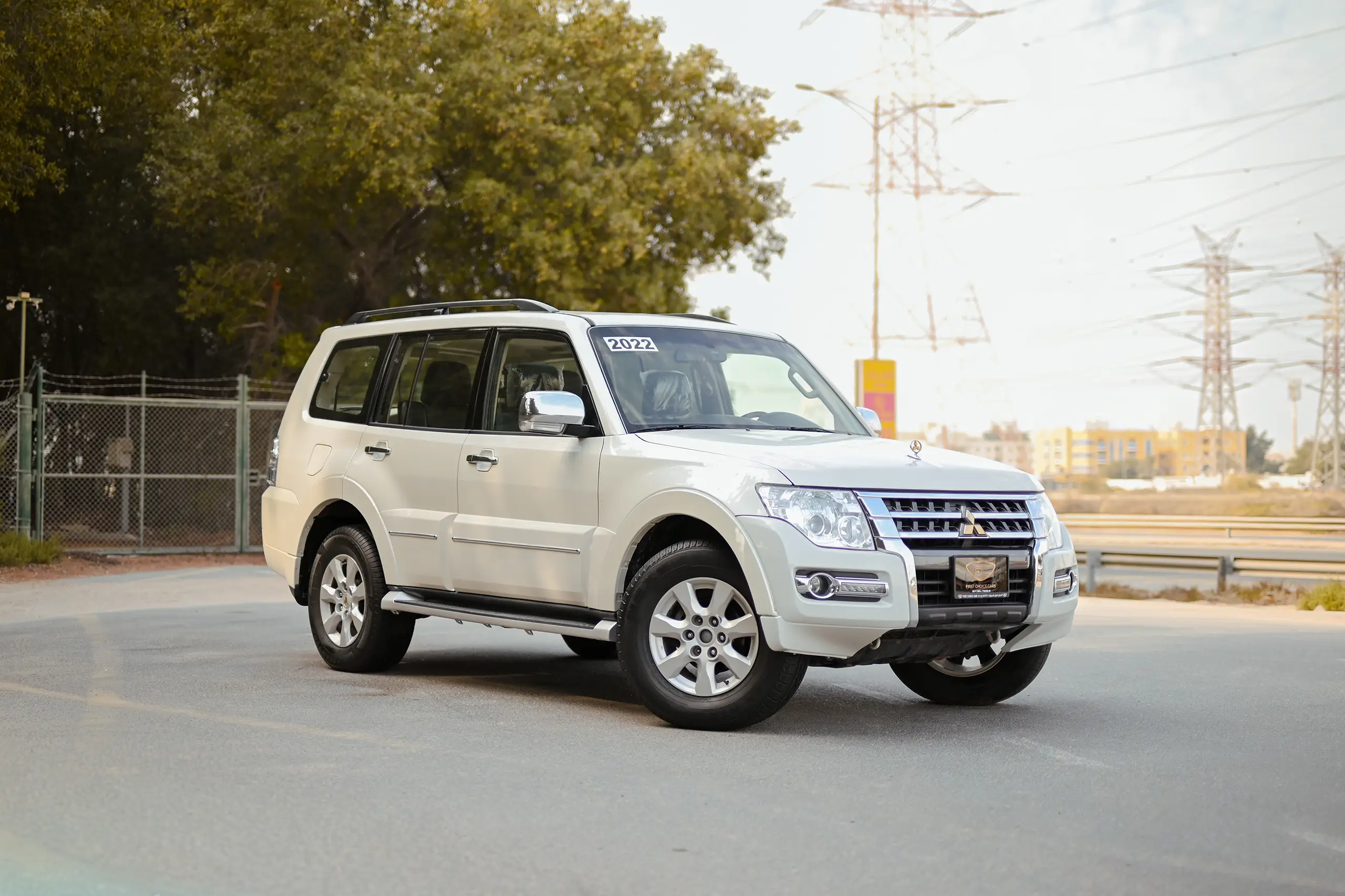 Used 2022 Mitsubishi PAJERO GLS White – Right Front Diagonal (45°) View at First Choice Cars Sharjah