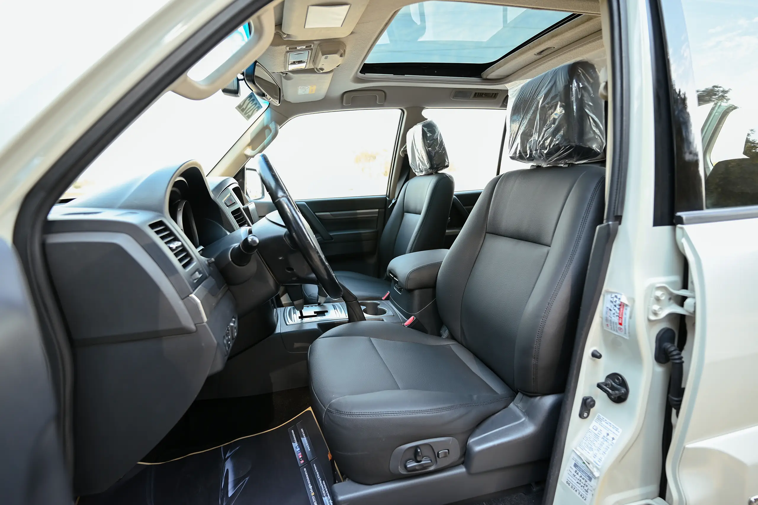 Used 2022 Mitsubishi Pajero GLS Midline in White – Front Driver Side Cabin View