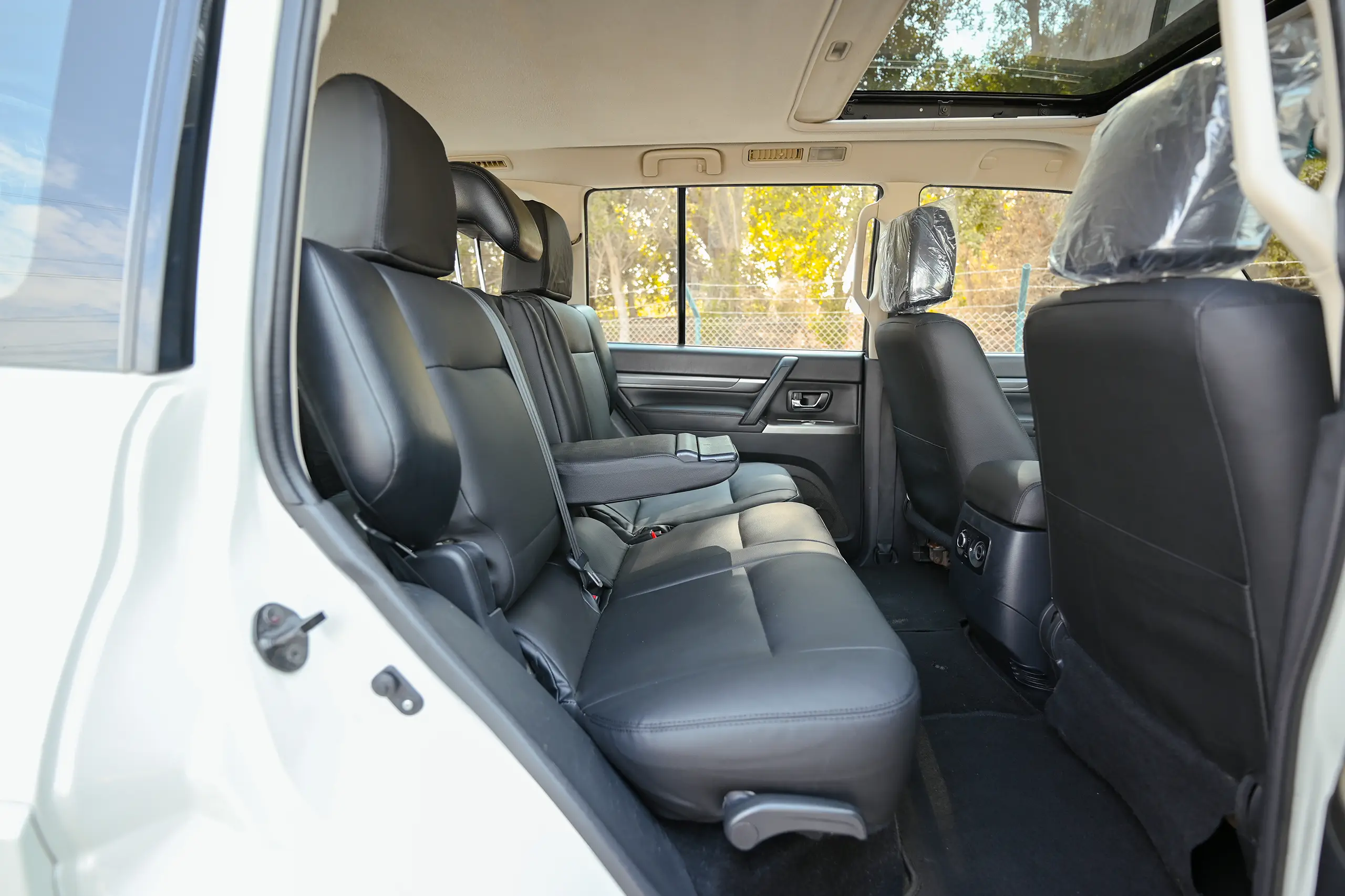 Used 2022 Mitsubishi Pajero GLS Midline in White – Rear Passenger Side Cabin View